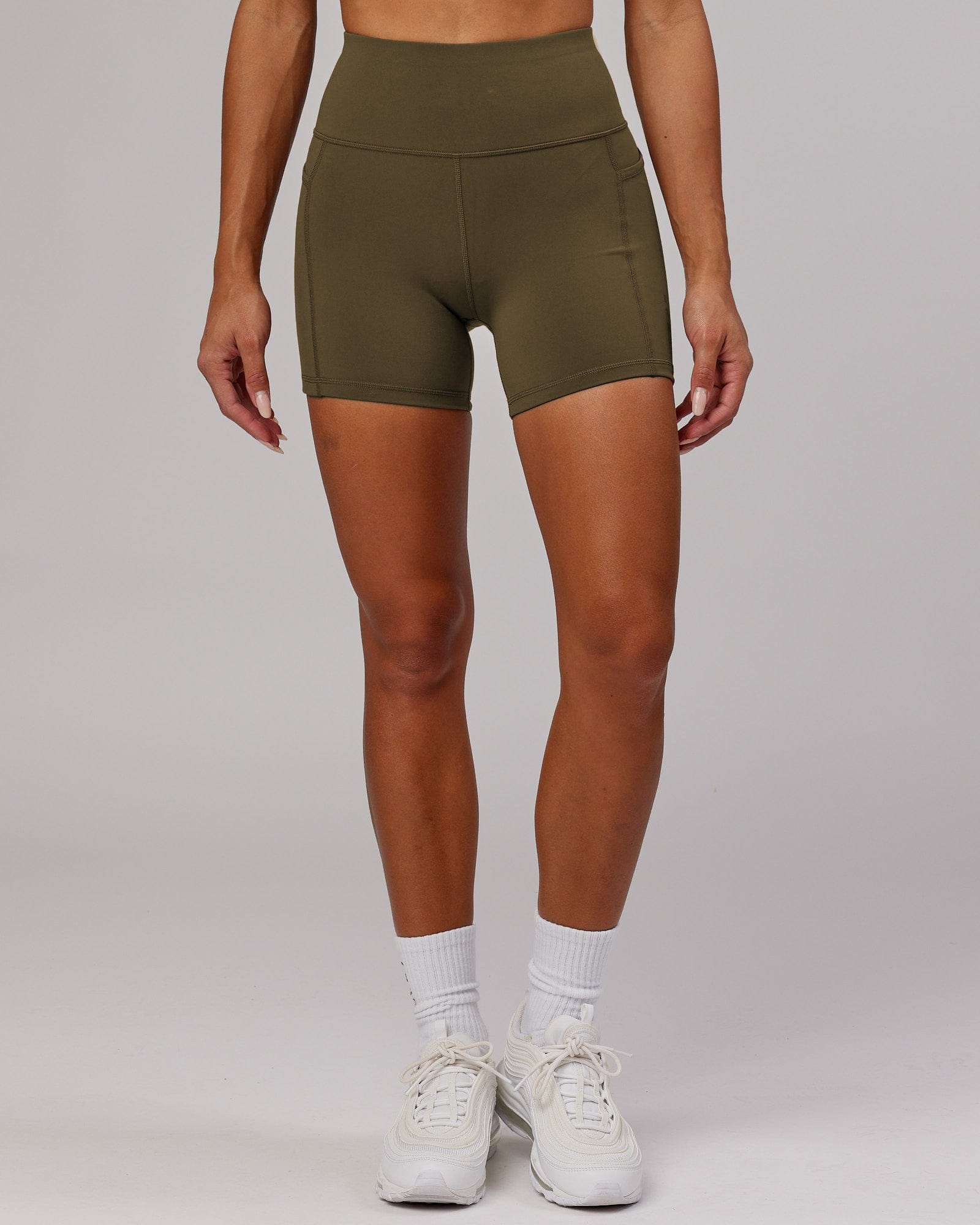 Model wearing Rep X-Short Tight - Army Green