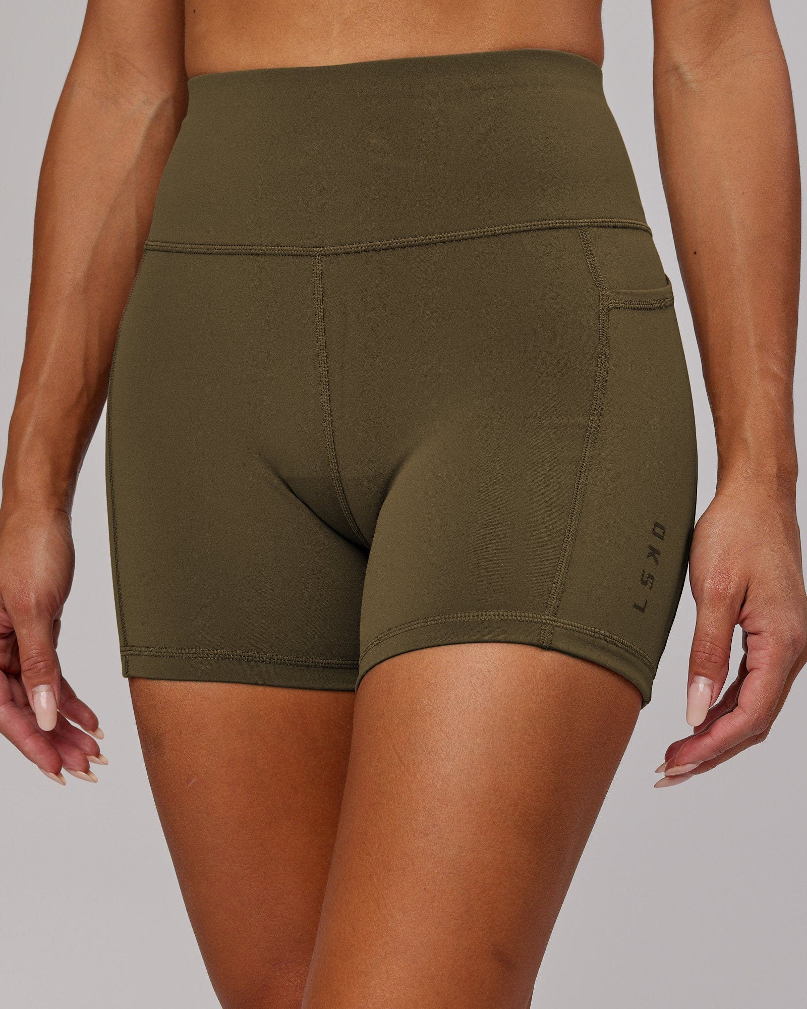 Model wearing Rep X-Short Tight - Army Green