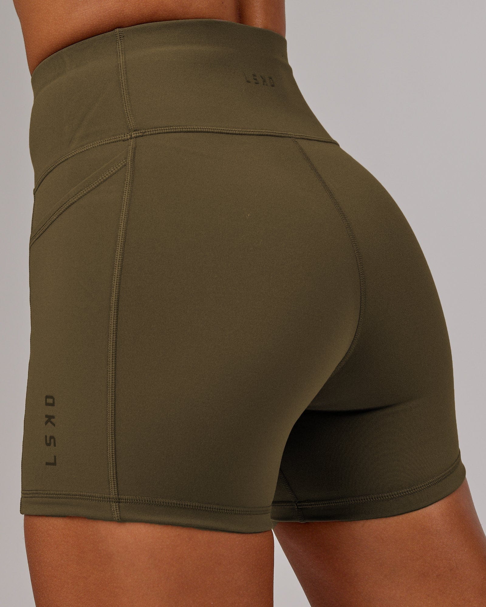 Model wearing Rep X-Short Tight - Army Green