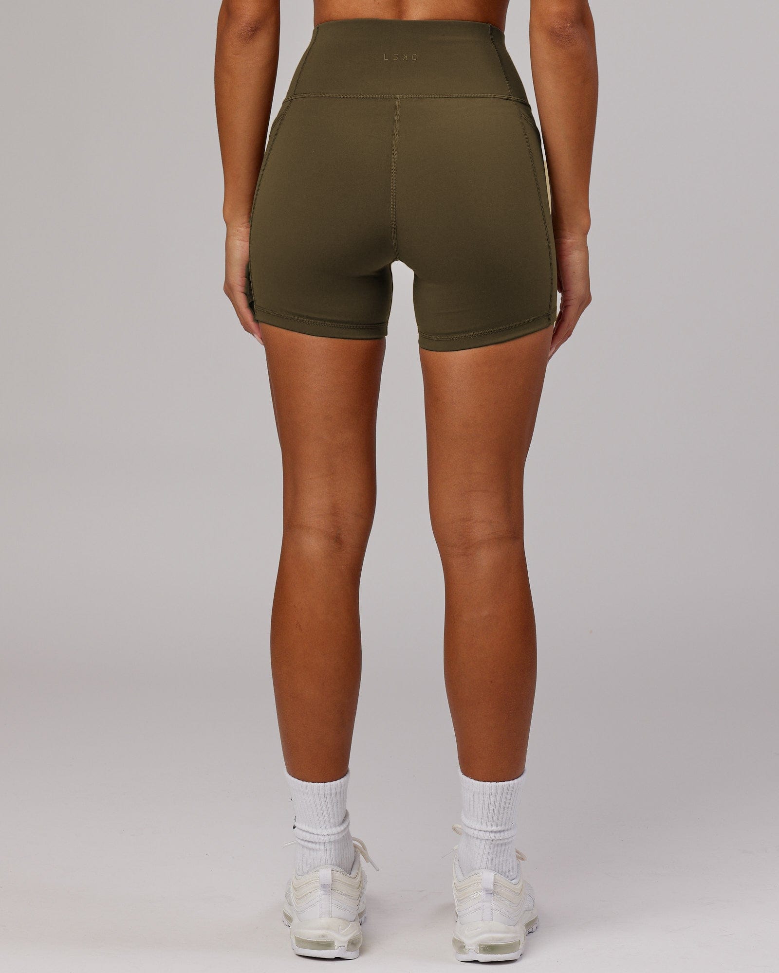 Model wearing Rep X-Short Tight - Army Green