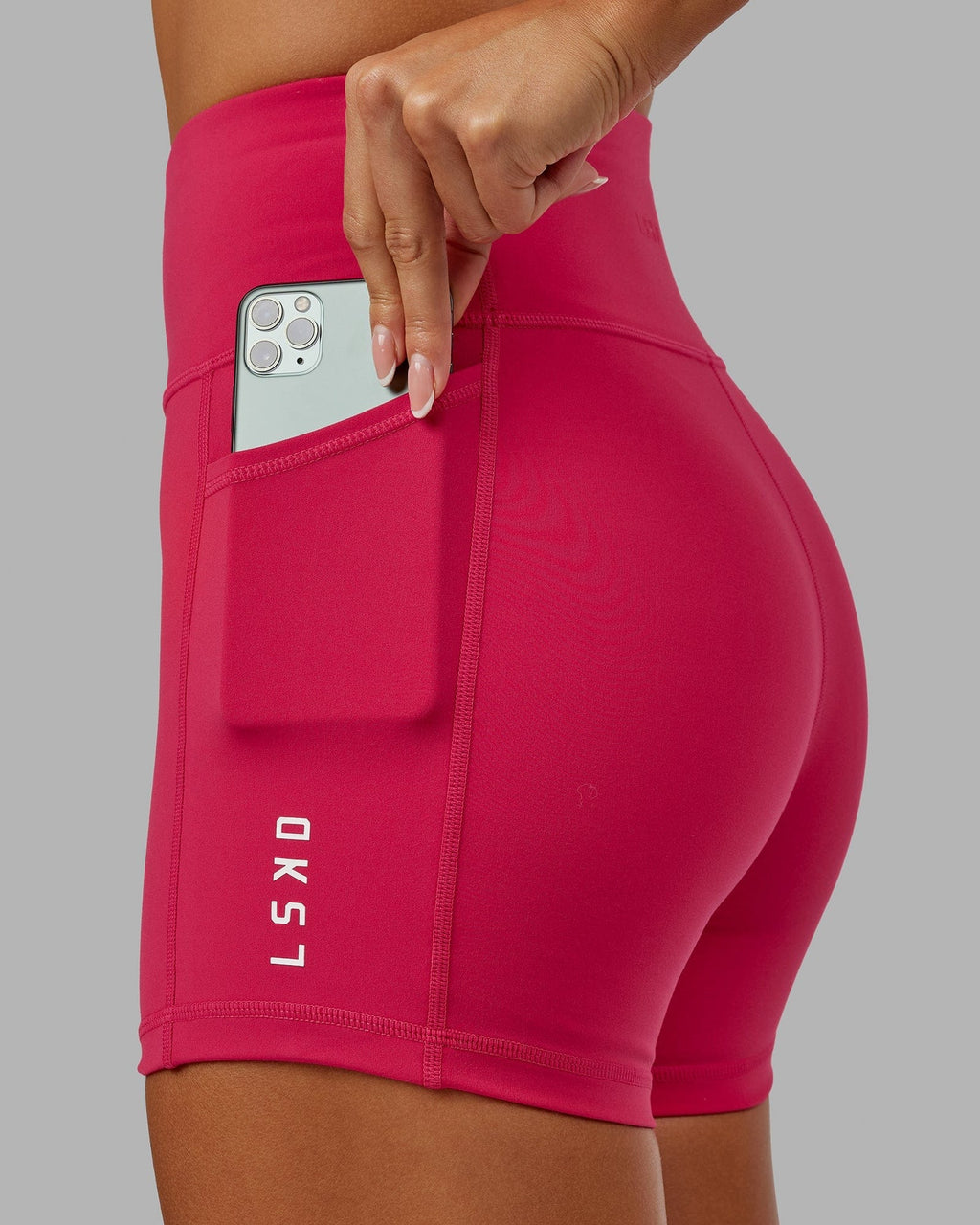 Model wearing Rep X-Short Tight - Boysenberry