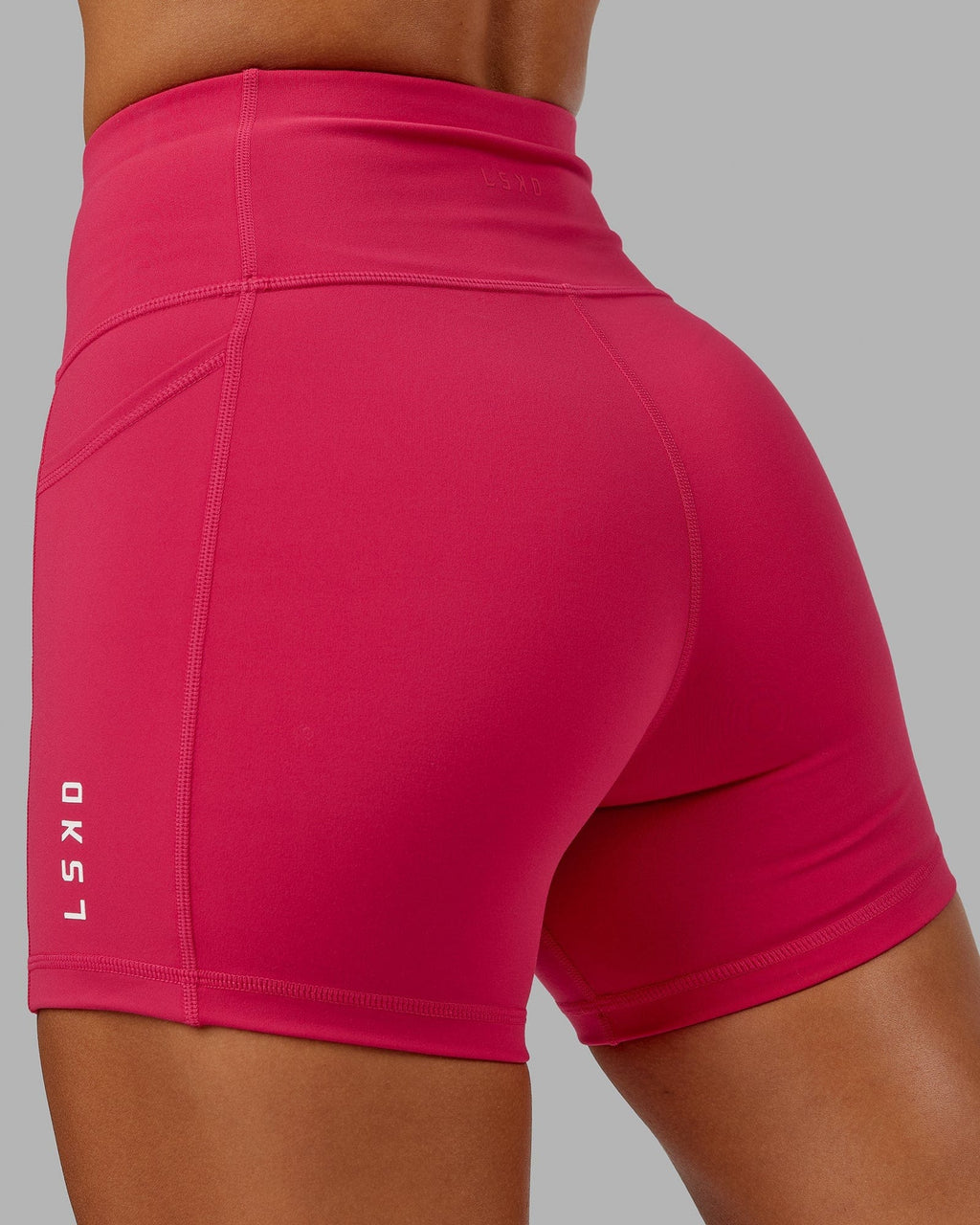 Model wearing Rep X-Short Tight - Boysenberry