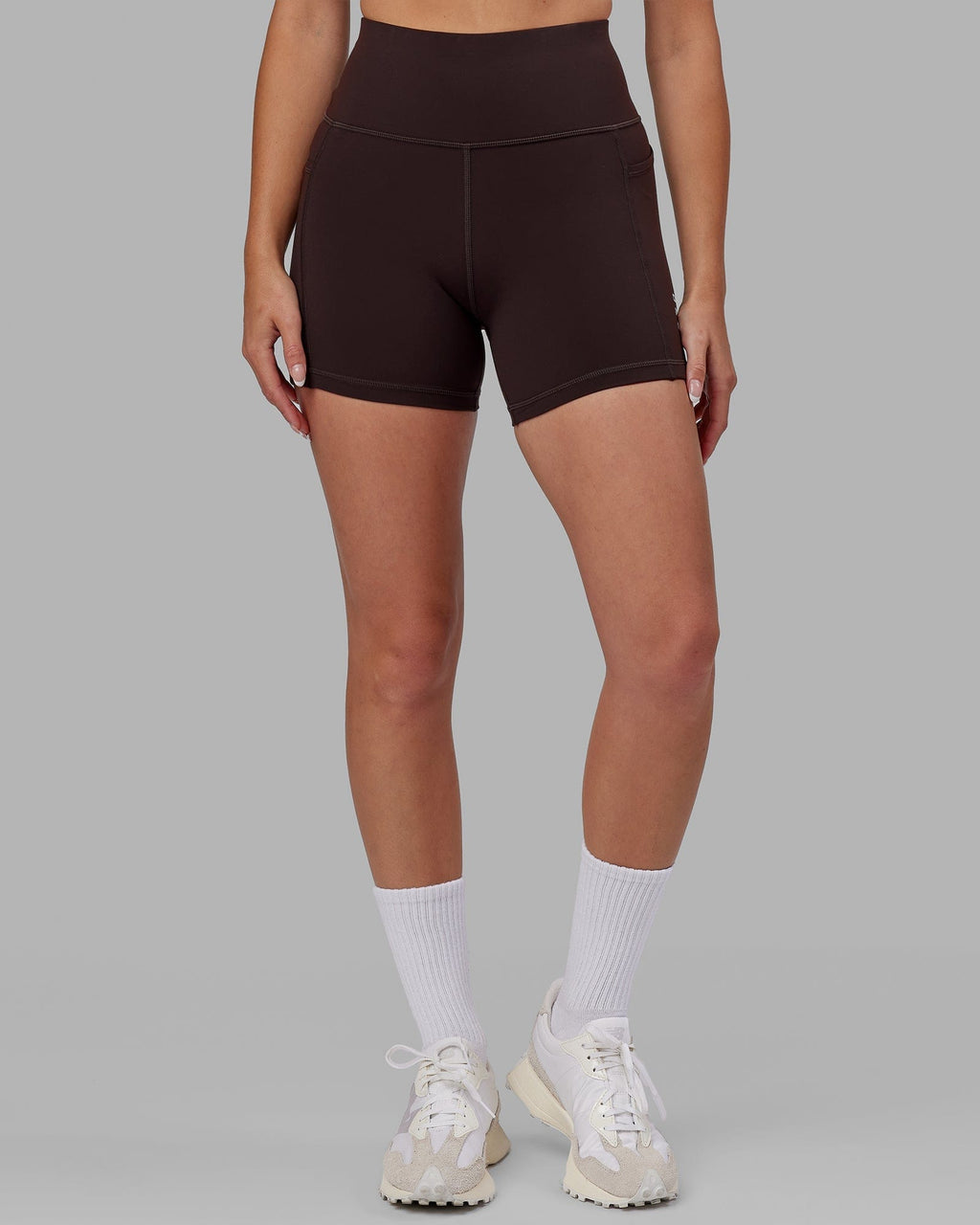 Model wearing Rep X-Short Tight - Dark Walnut