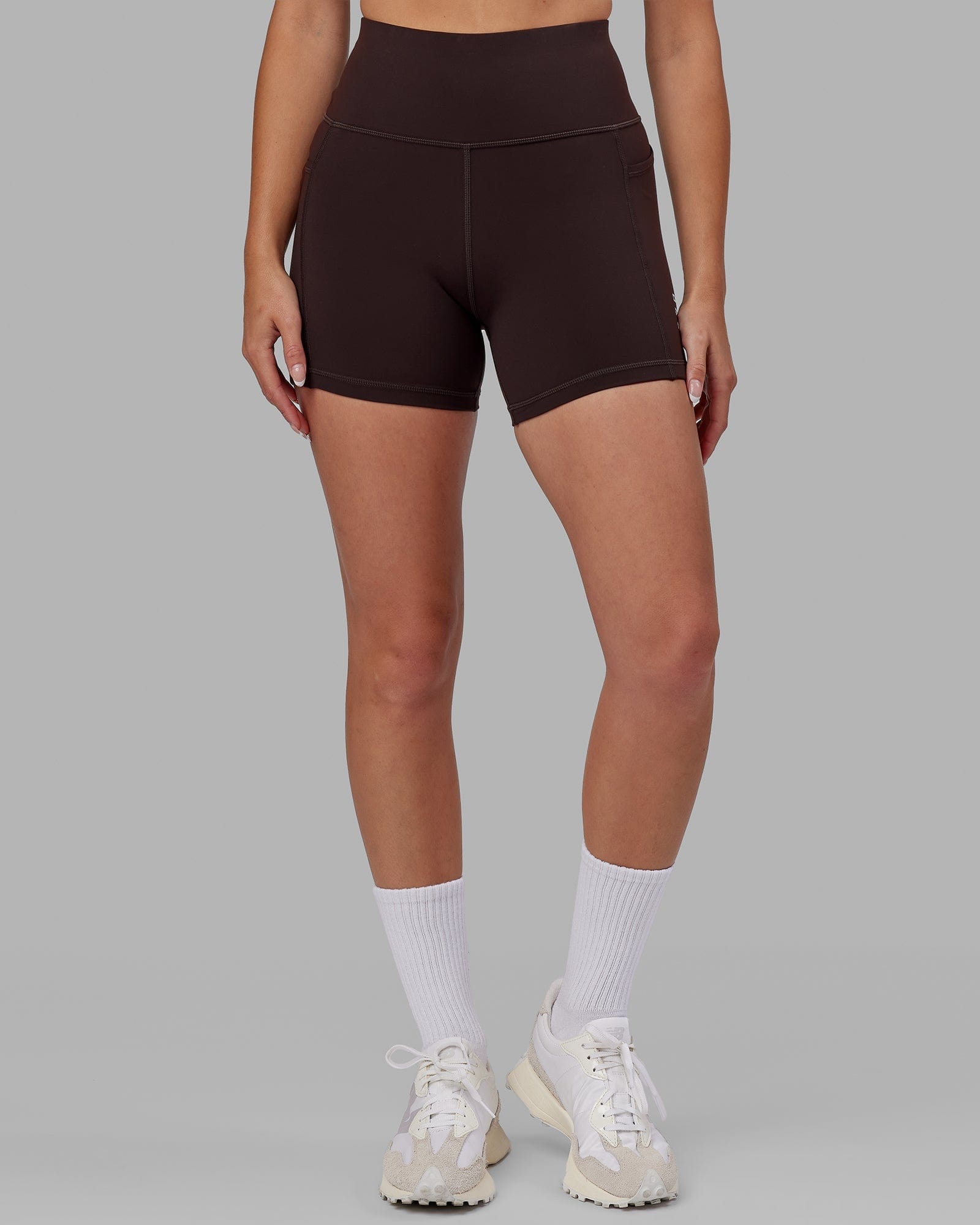 Model wearing Rep X-Short Tight - Dark Walnut