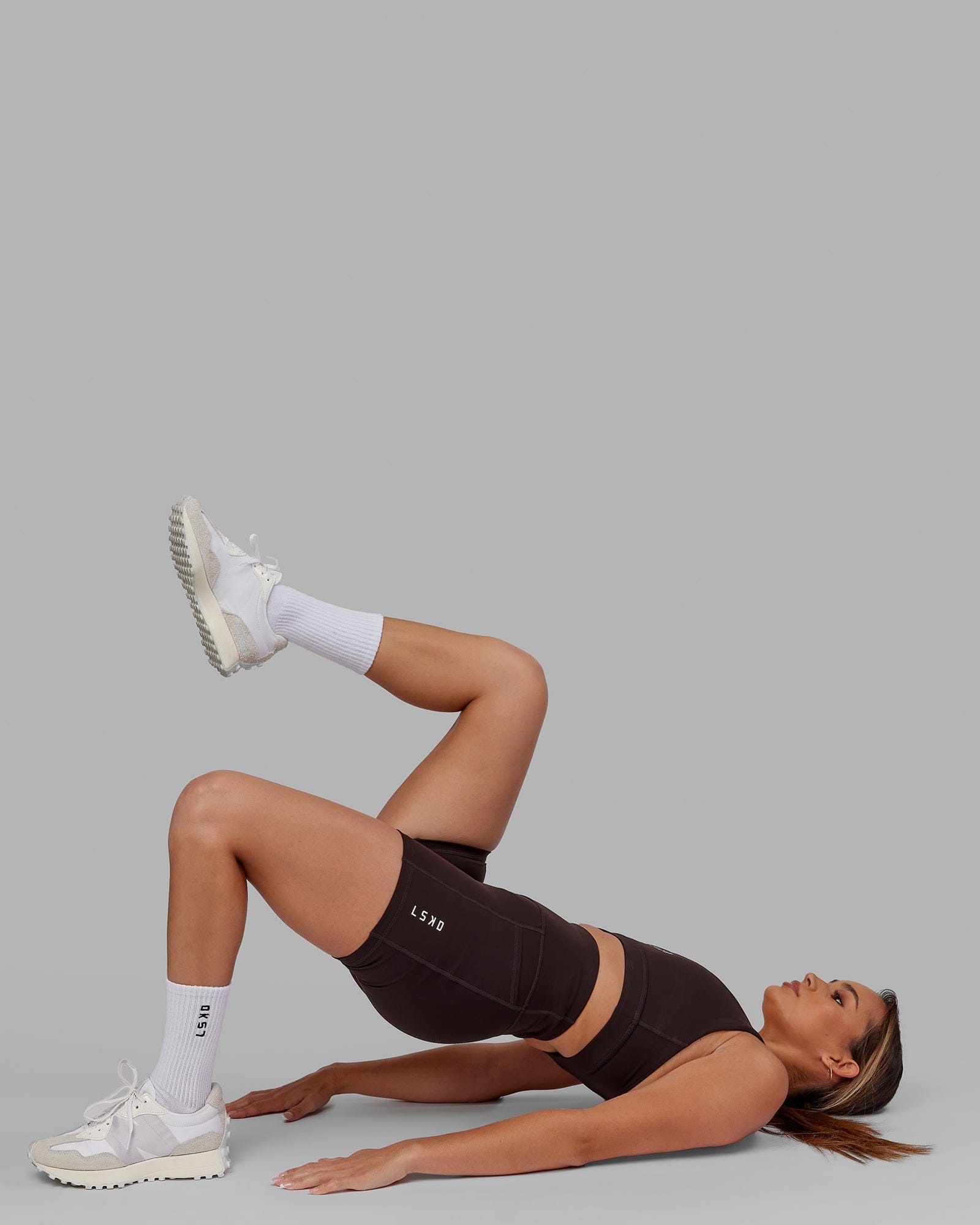 Model wearing Rep X-Short Tight - Dark Walnut