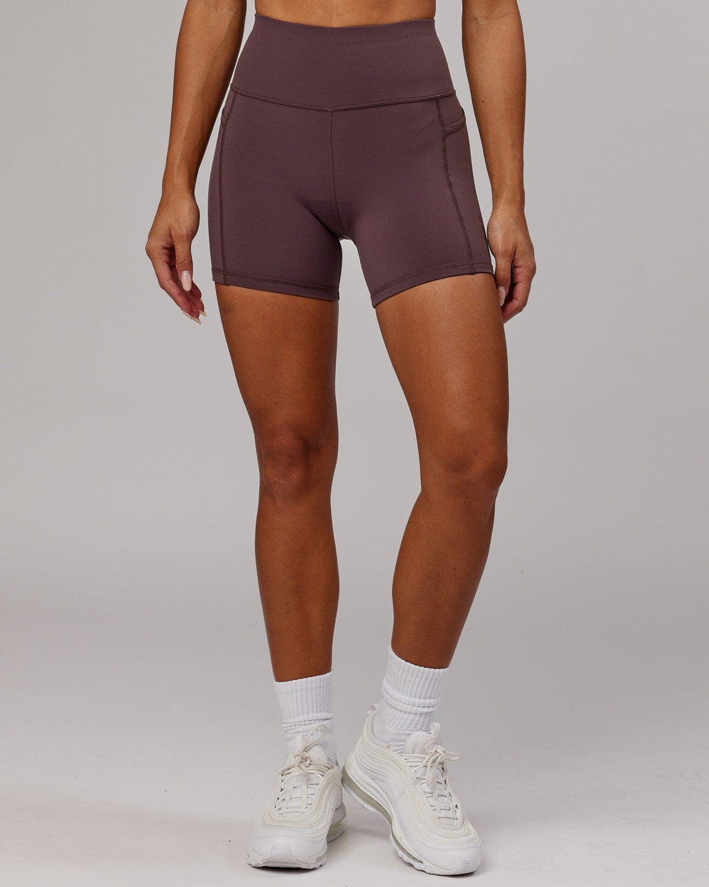 Model wearing Rep X-Short Tight - Plum