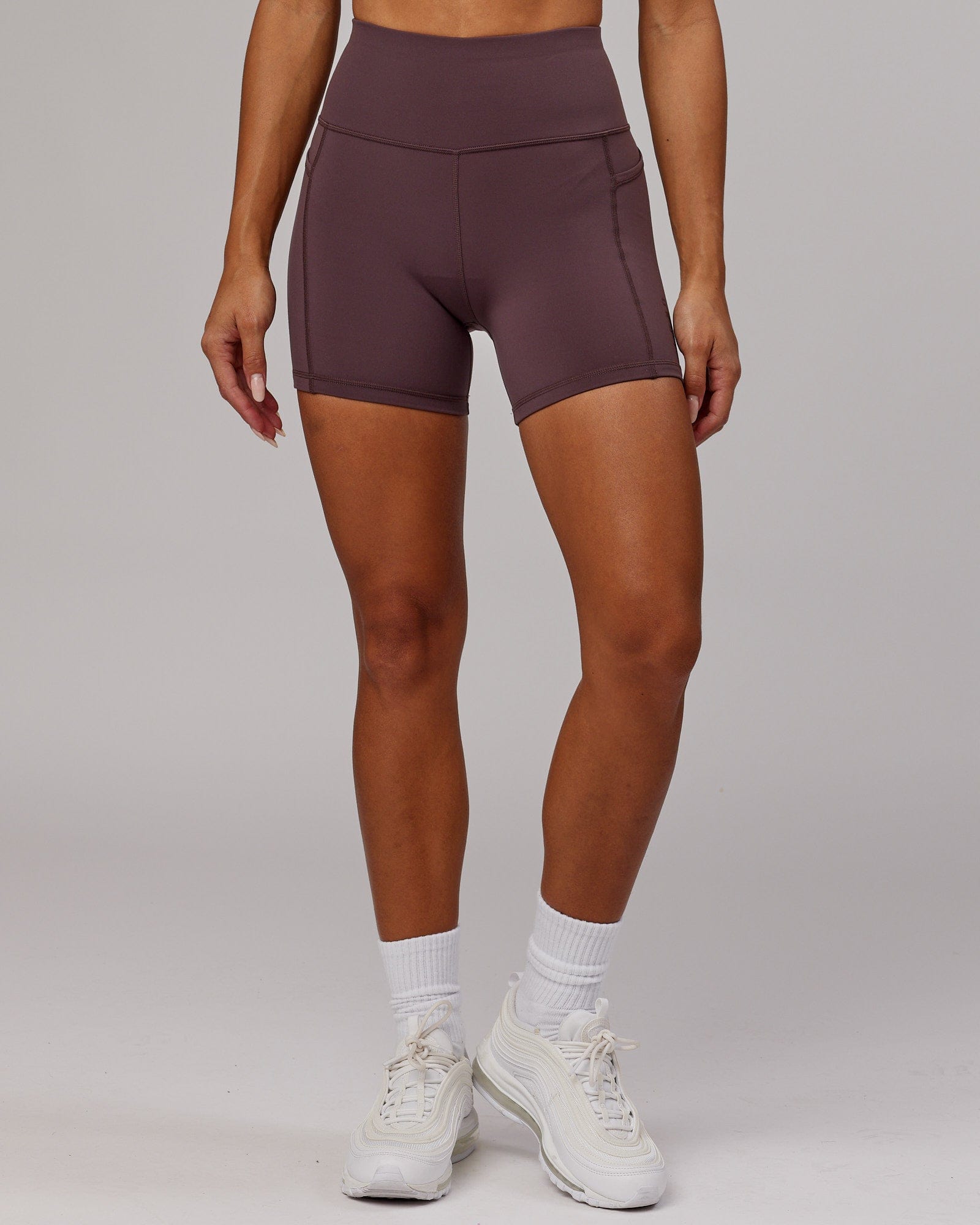 Model wearing Rep X-Short Tight - Plum