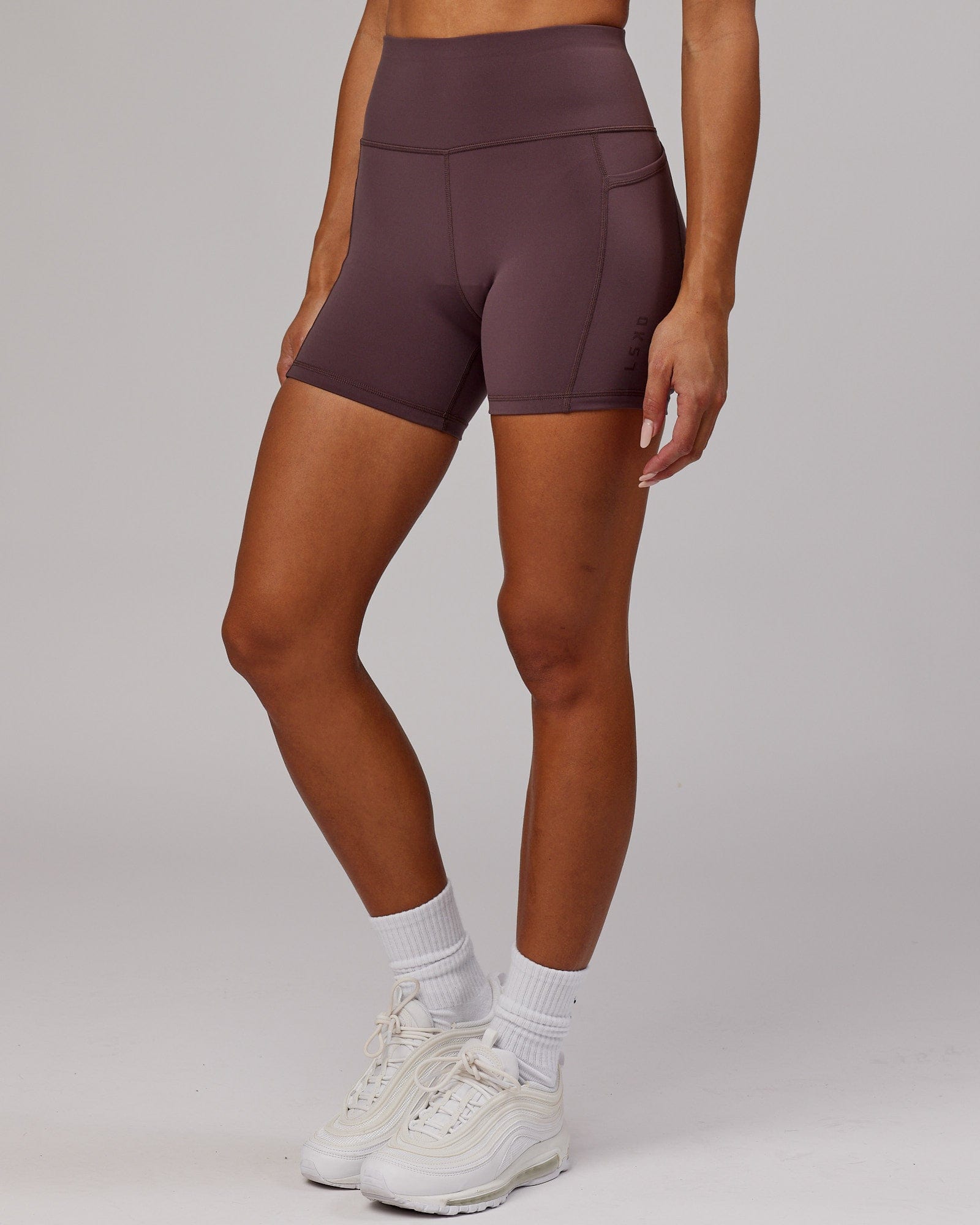Model wearing Rep X-Short Tight - Plum