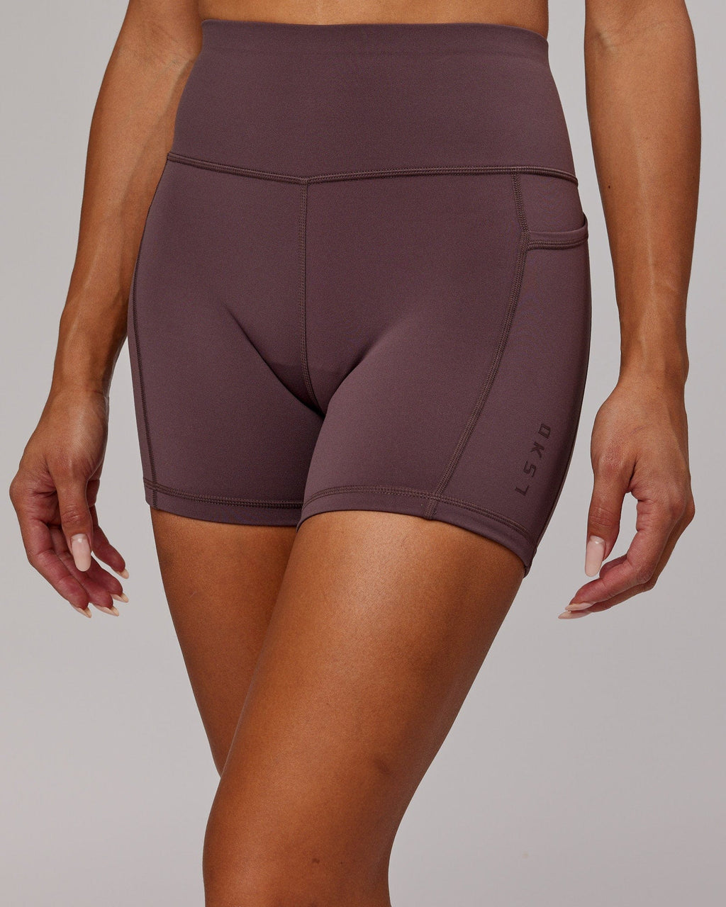 Model wearing Rep X-Short Tight - Plum