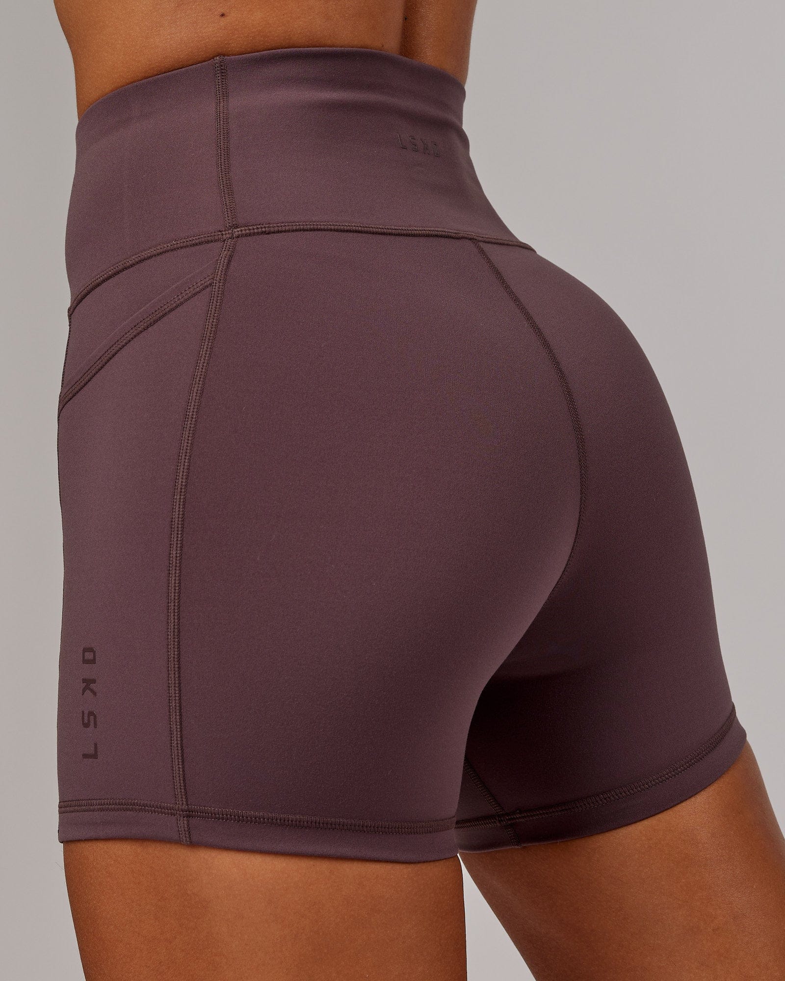 Model wearing Rep X-Short Tight - Plum