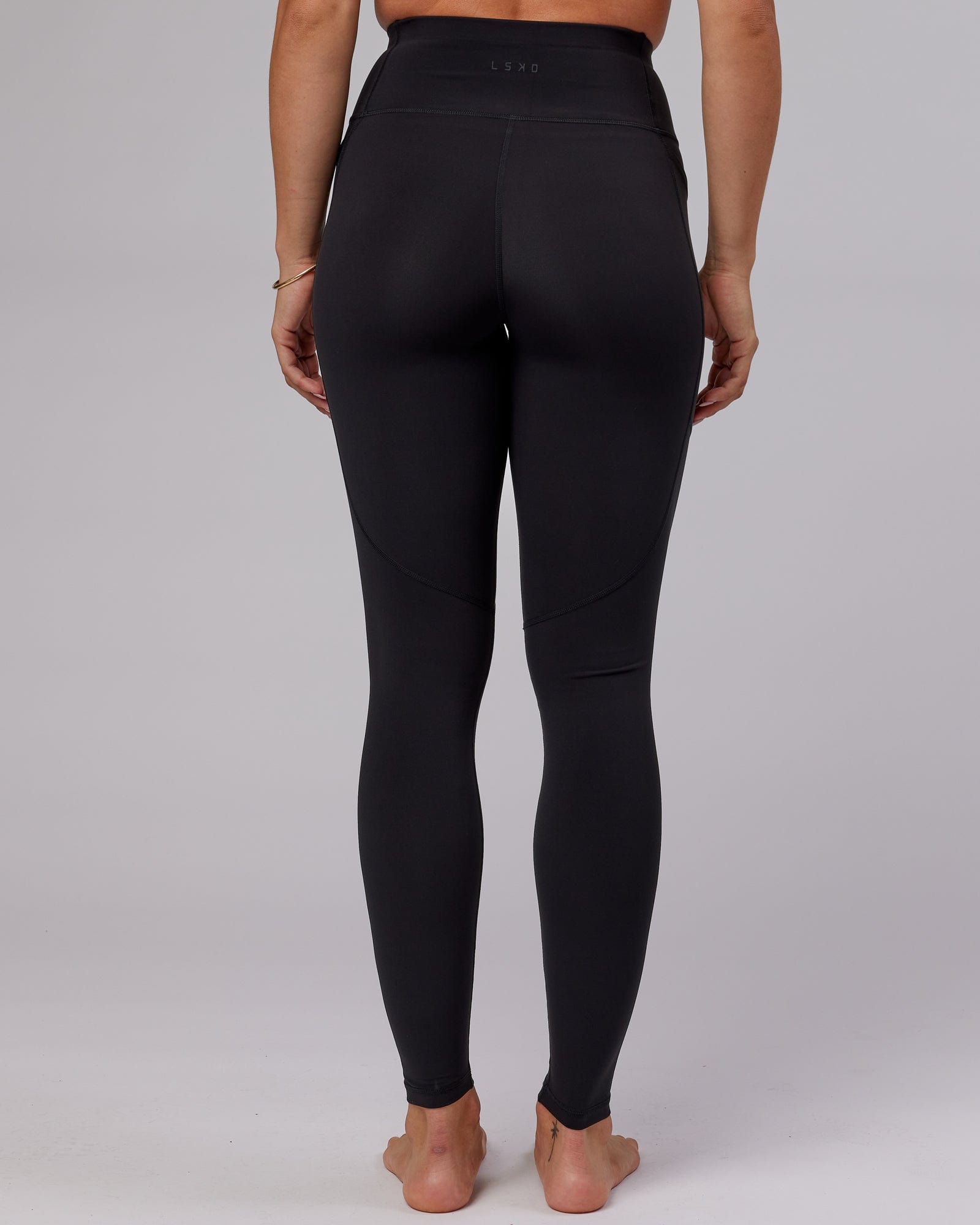 Model wearing Rep X-Long Tight - Black-Boysenberry