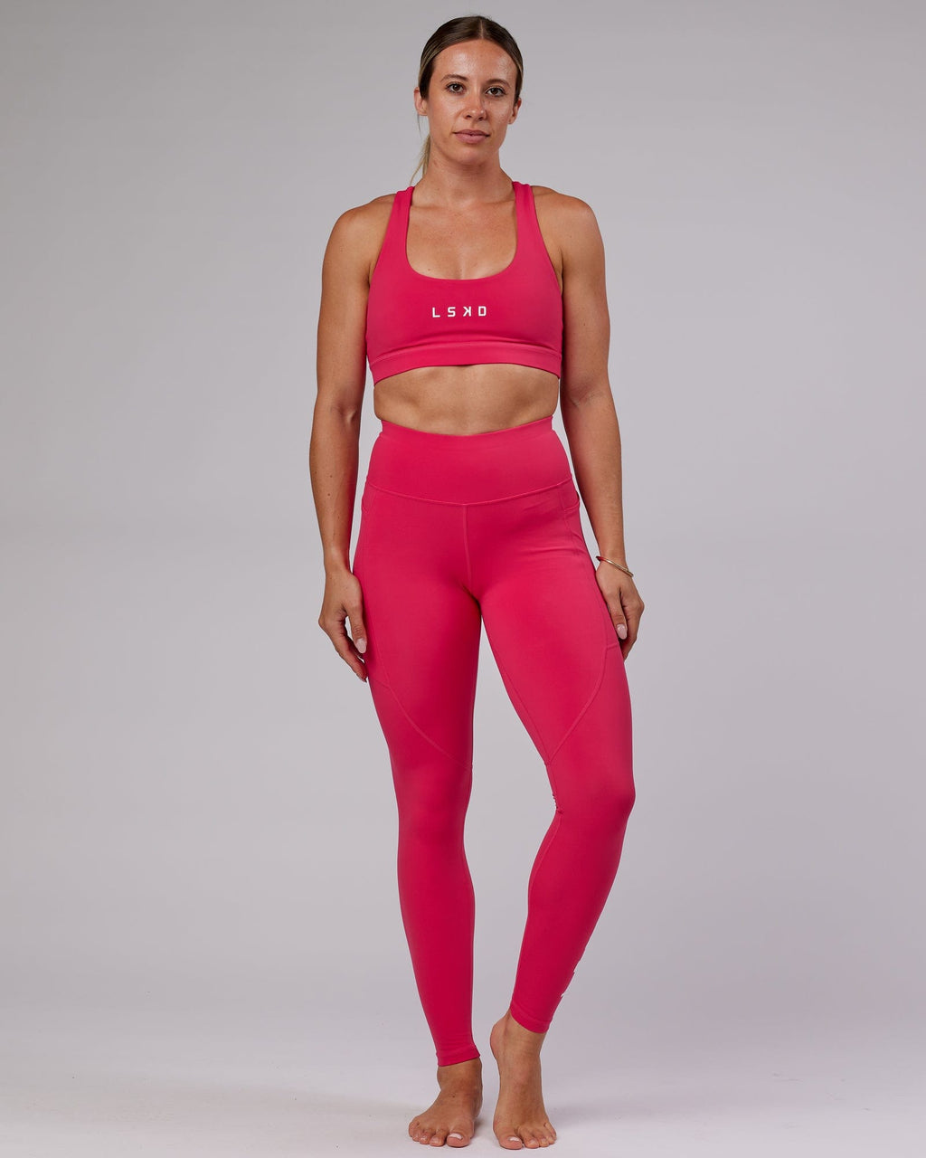 Model wearing Rep X-Long Tight - Boysenberry