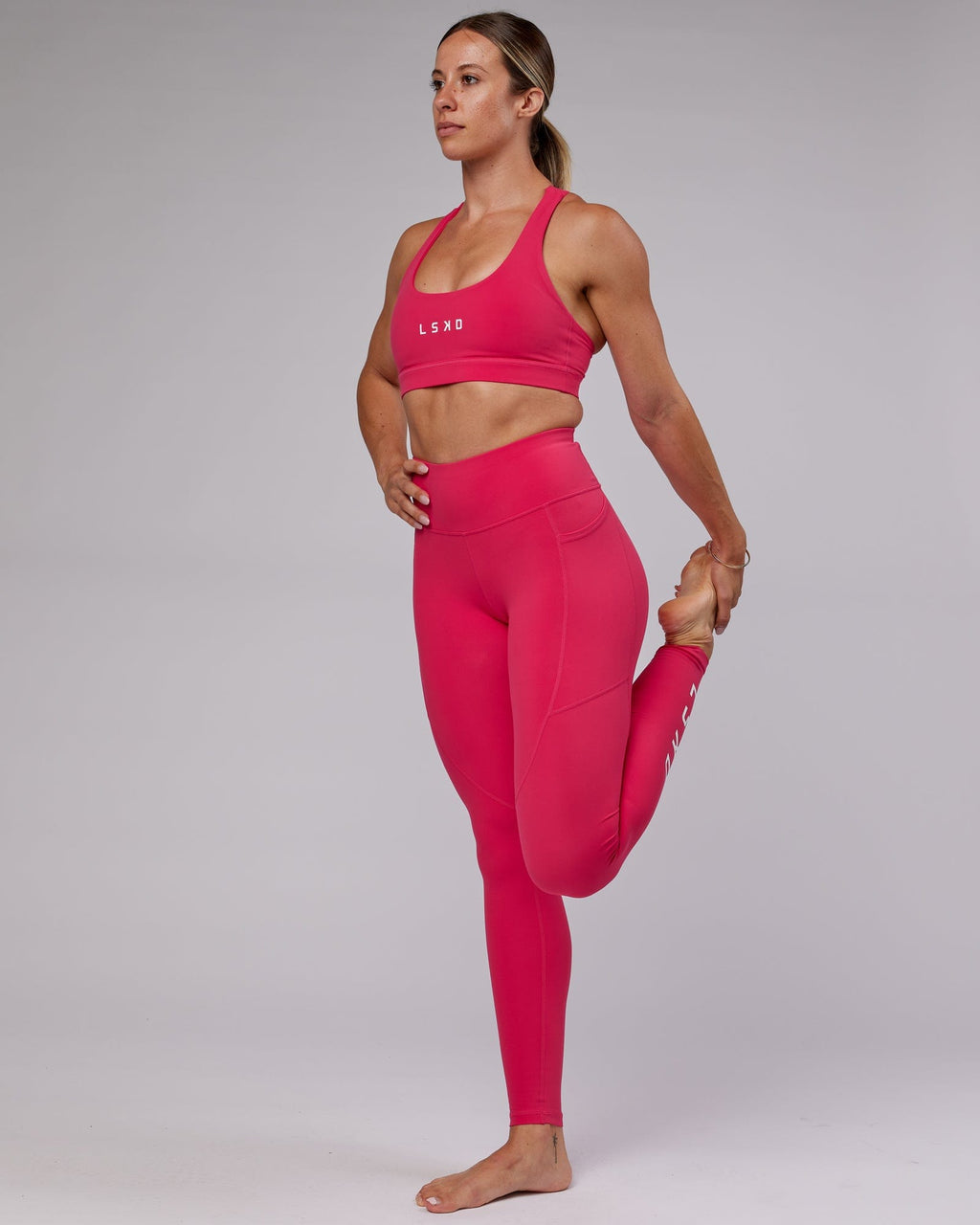 Model wearing Rep X-Long Tight - Boysenberry