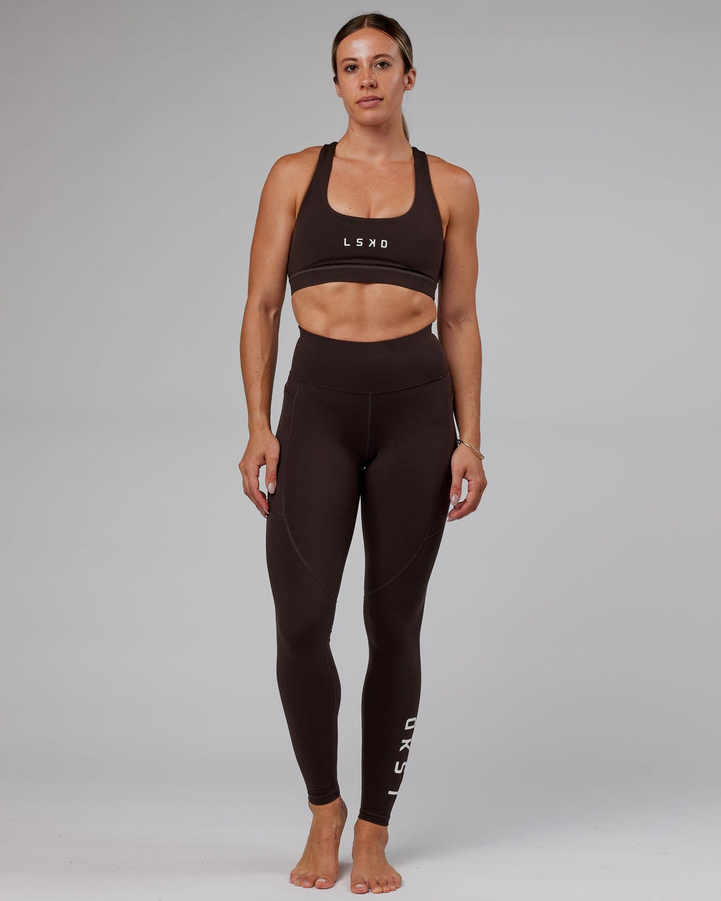 Model wearing Rep X-Long Tight - Dark Walnut