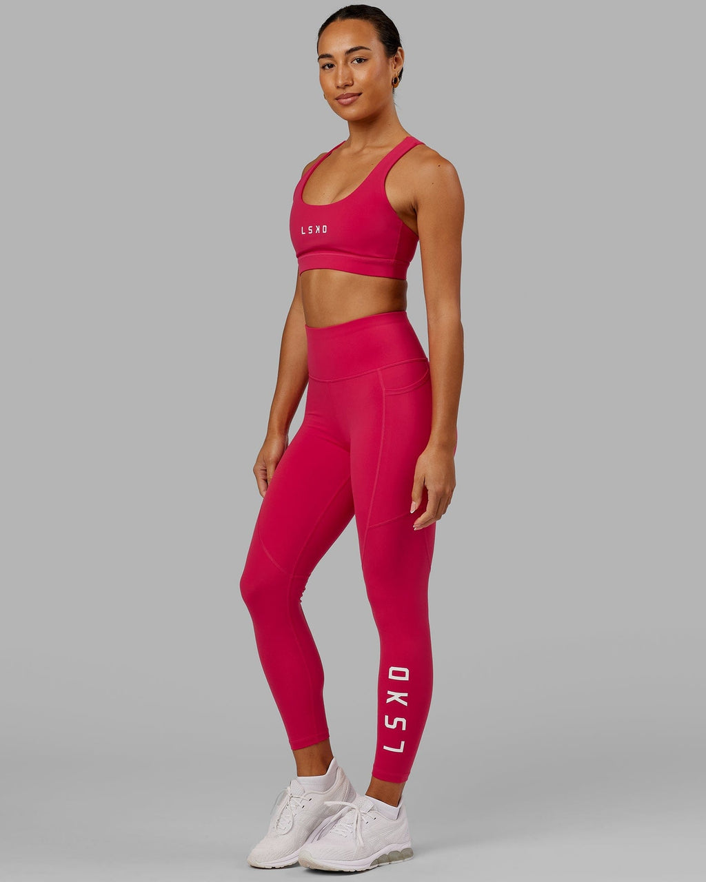 Model wearing Rep 7/8 Length Tight - Boysenberry