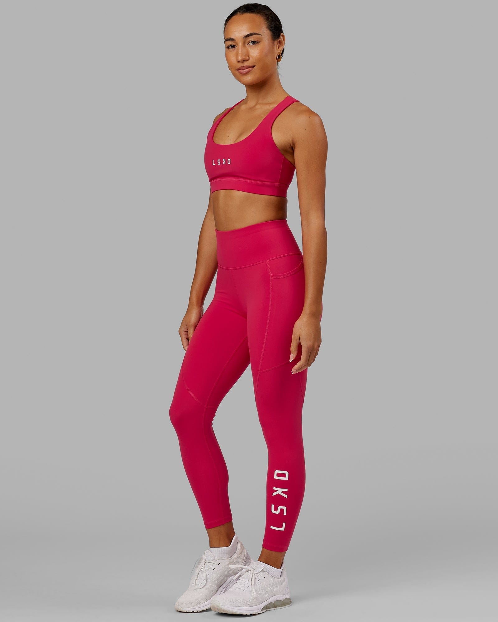 Model wearing Rep 7/8 Length Tight - Boysenberry