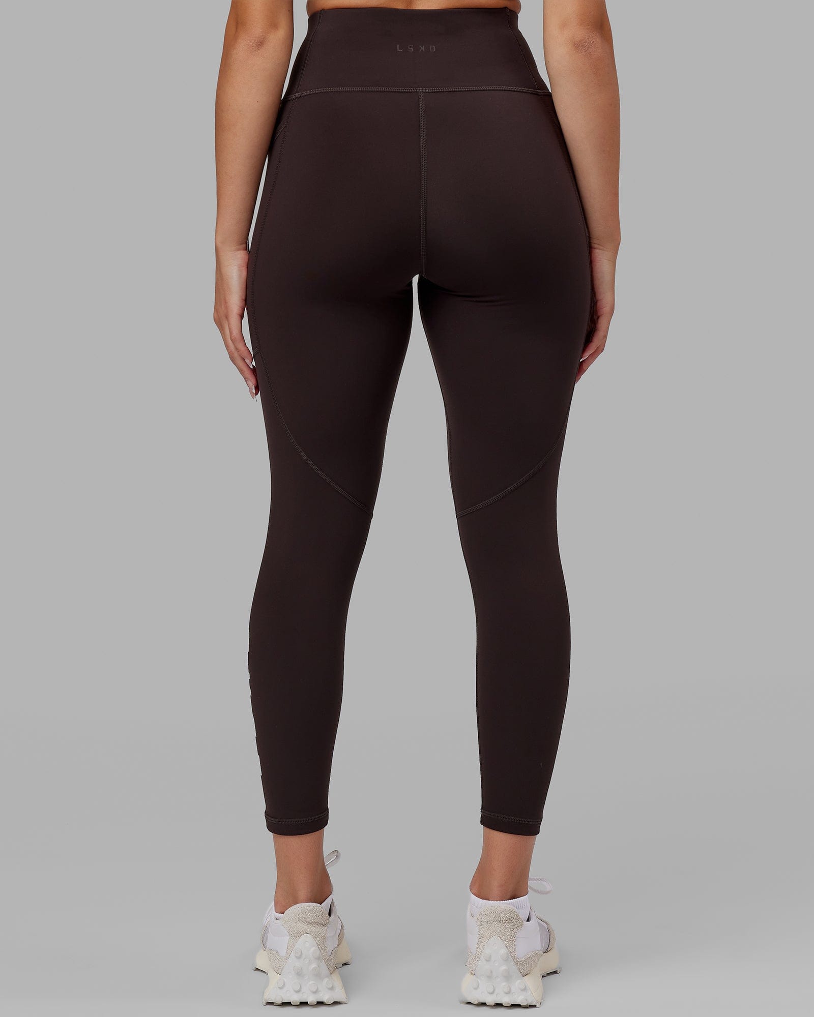 Model wearing Rep 7/8 Length Tight - Dark Walnut