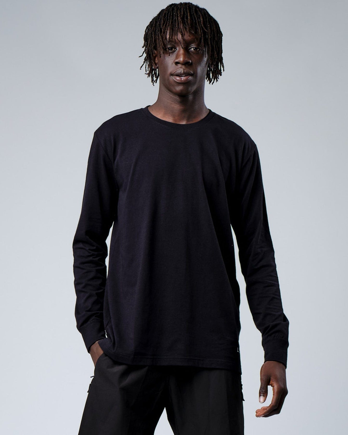 Model wearing Intensity FLXDRY Performance LS Tee - Black