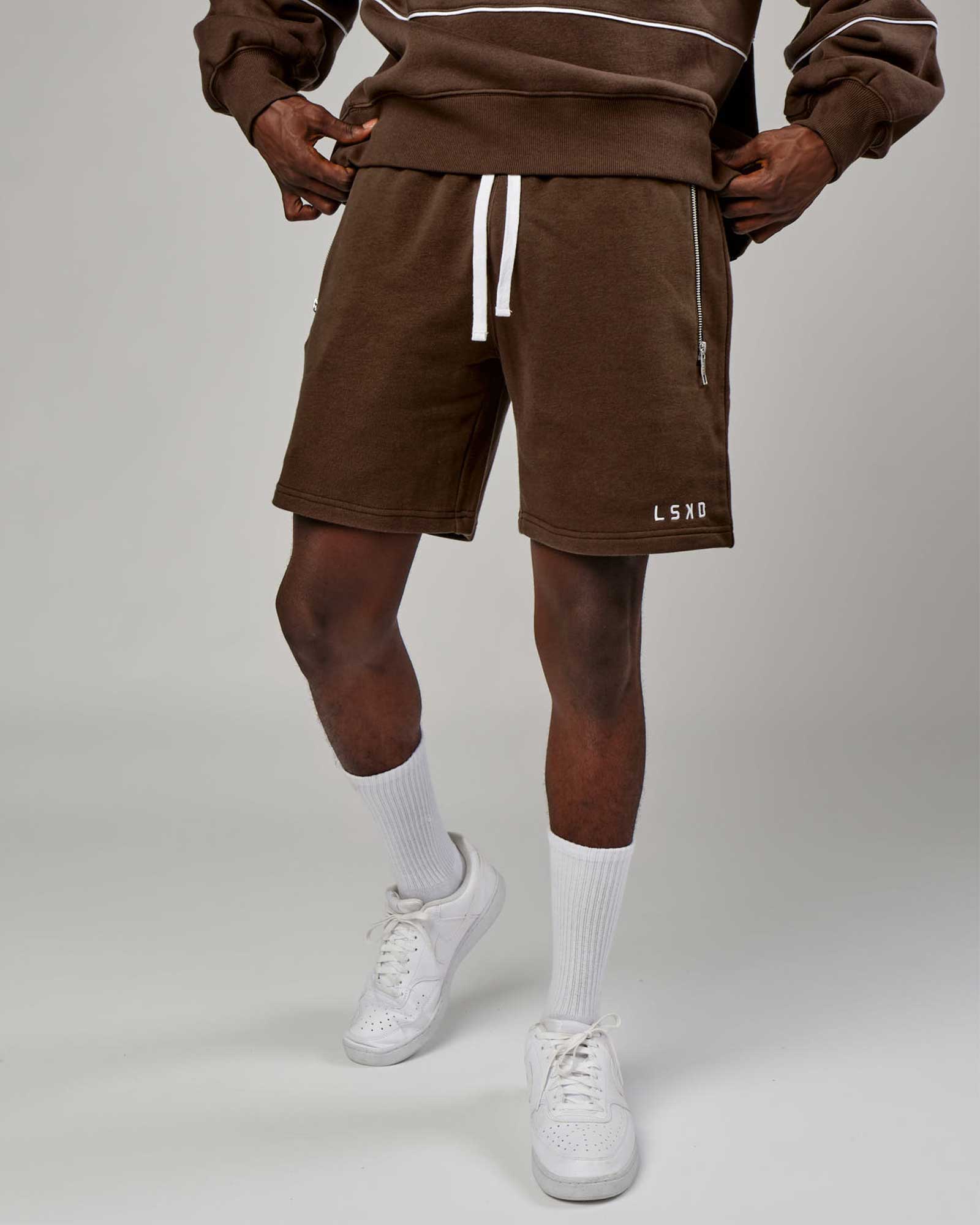 Model wearing Connor Track Short - Walnut