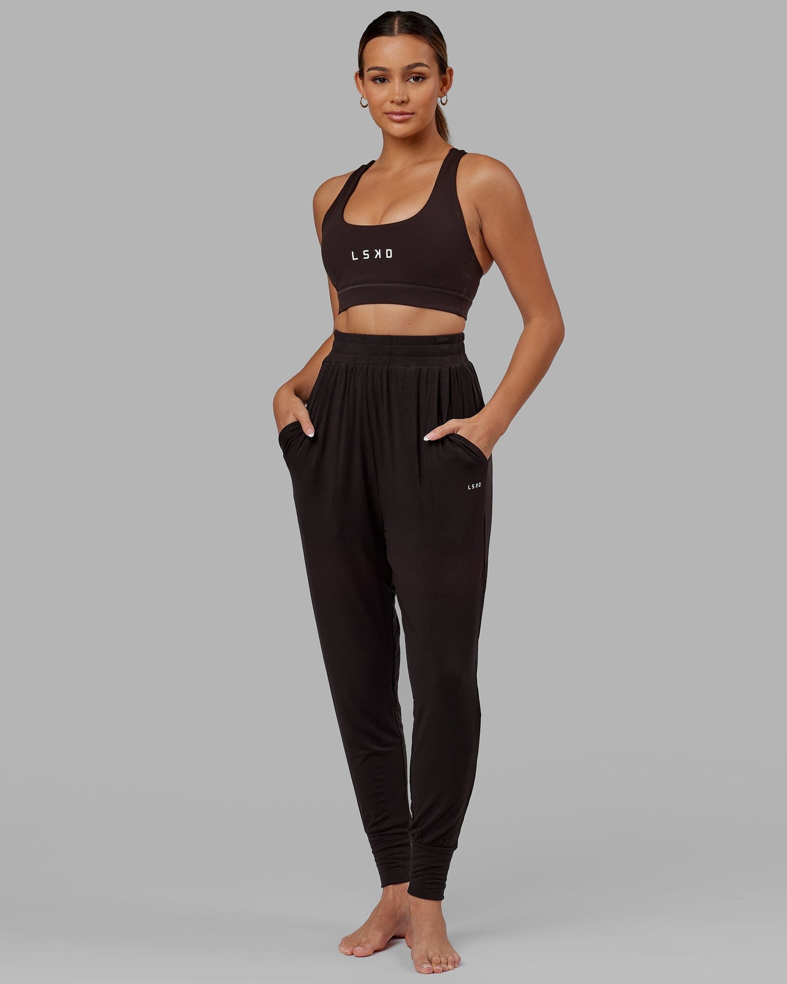 Model wearing Rest and Recover Pant - Dark Walnut