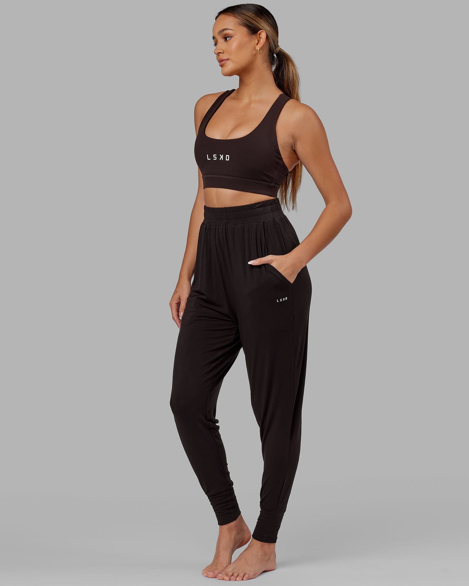 Model wearing Rest and Recover Pant - Dark Walnut