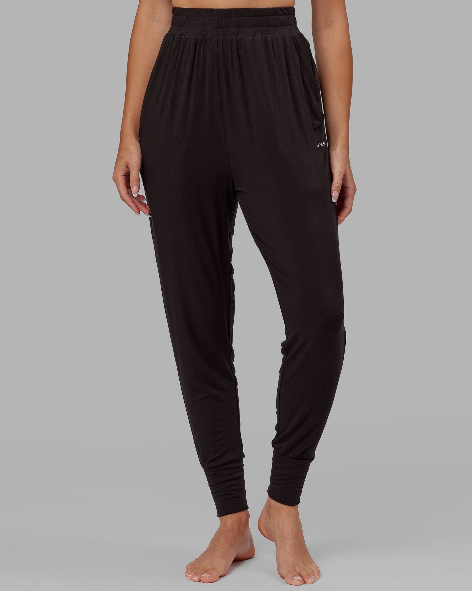 Model wearing Rest and Recover Pant - Dark Walnut