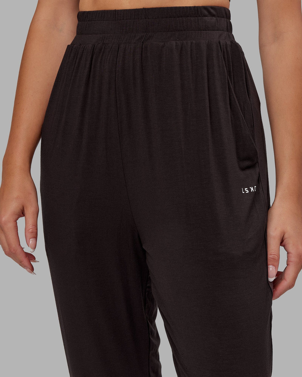 Model wearing Rest and Recover Pant - Dark Walnut