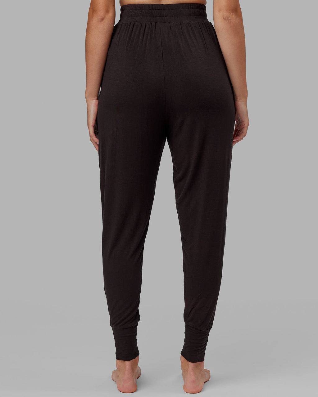 Model wearing Rest and Recover Pant - Dark Walnut