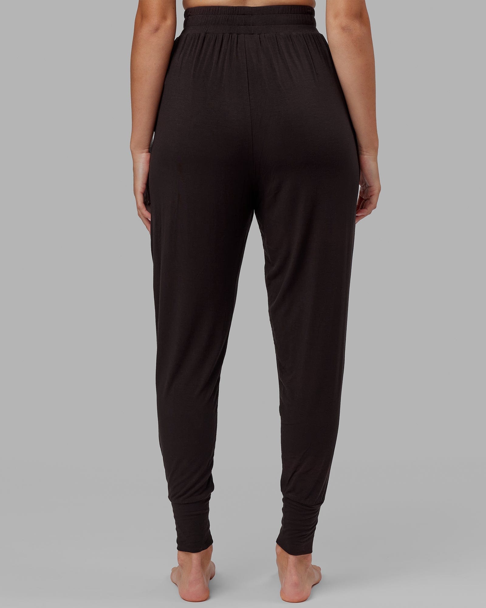 Model wearing Rest and Recover Pant - Dark Walnut