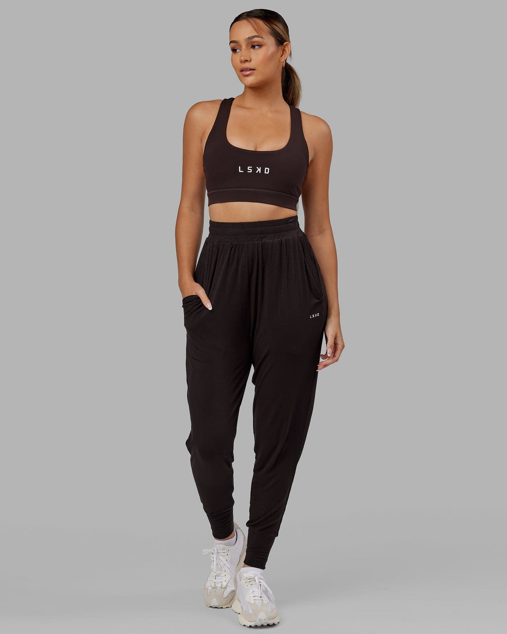 Model wearing Rest and Recover Pant - Dark Walnut