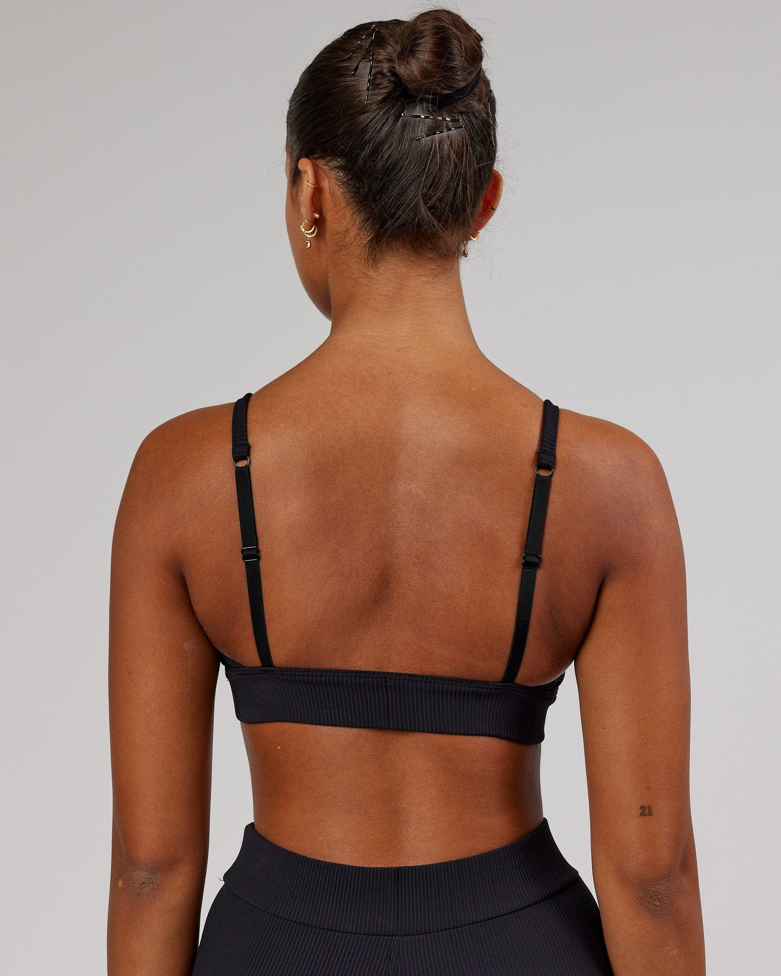 Model wearing Vitalize Ribbed Bralette - Black