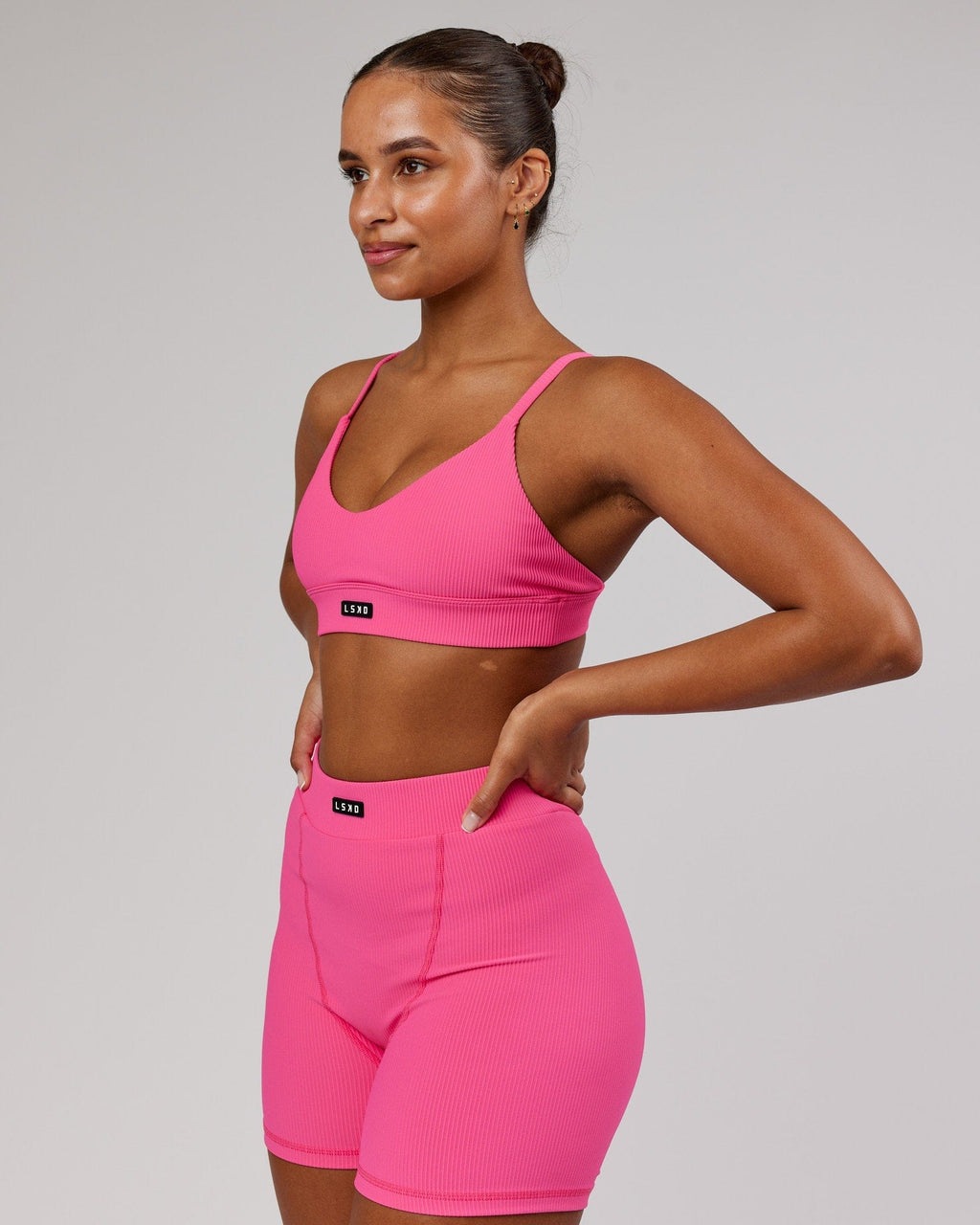 Model wearing Vitalize Ribbed Bralette - Flamingo