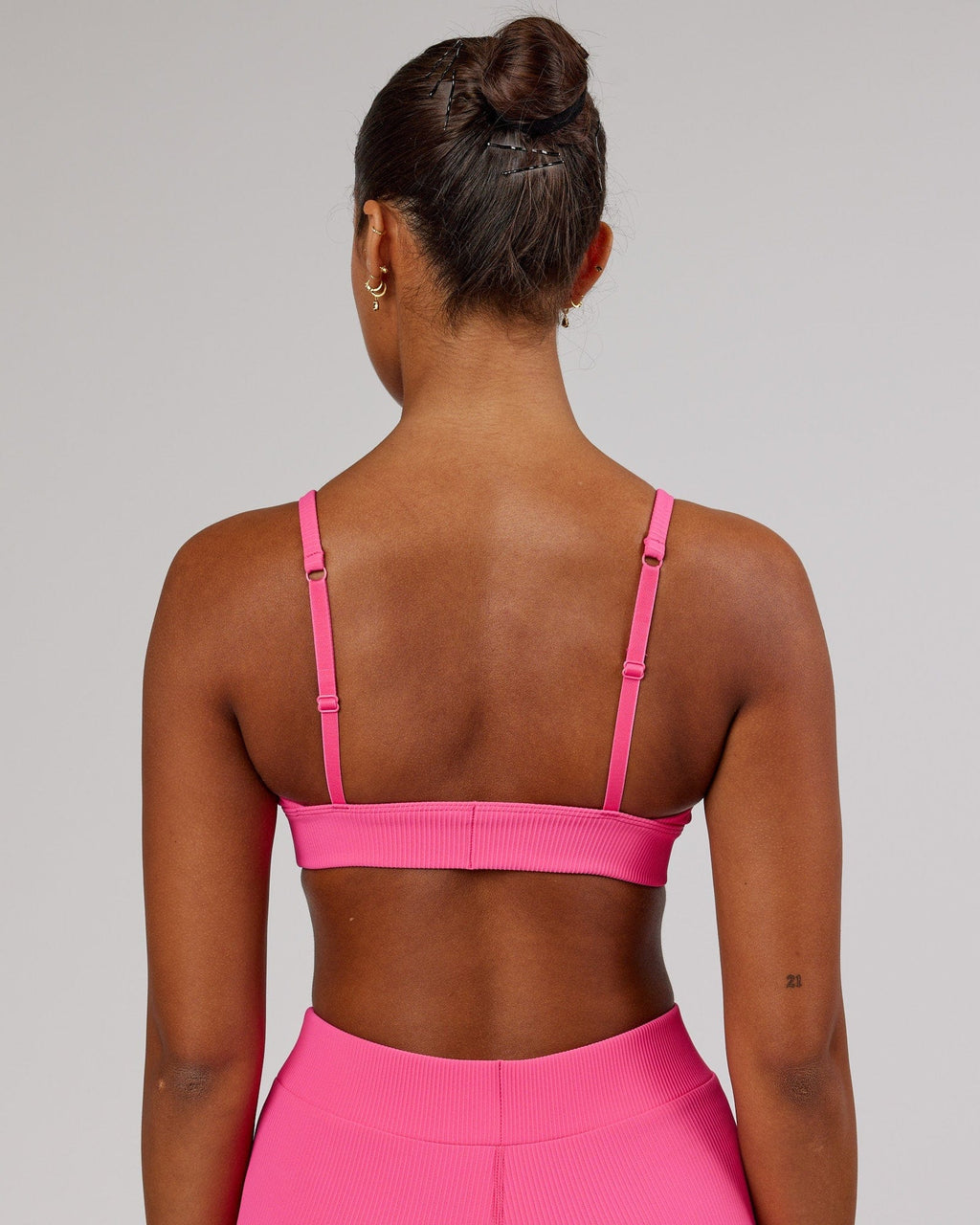 Model wearing Vitalize Ribbed Bralette - Flamingo