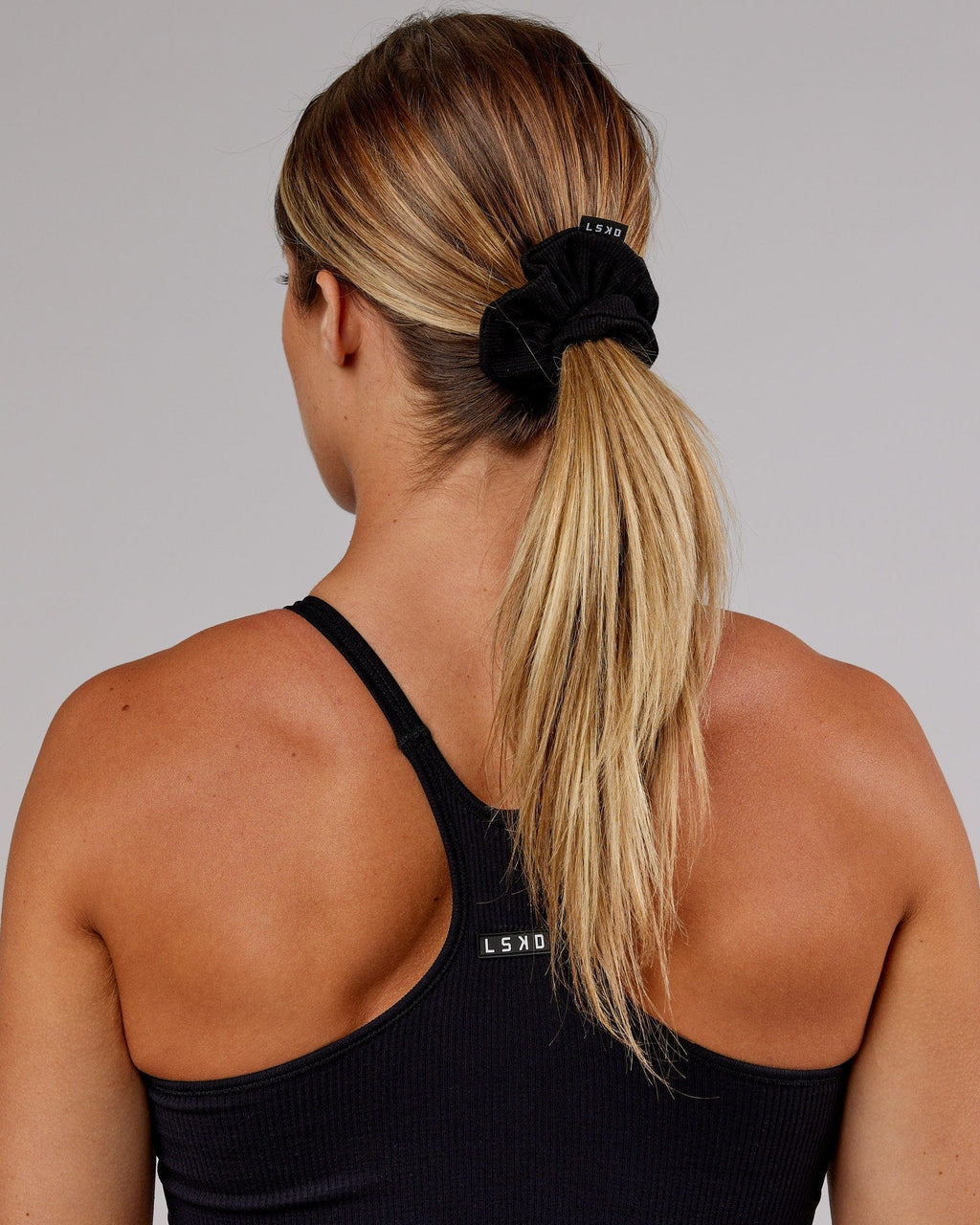 Model wearing Ribbed Scrunchie - Black