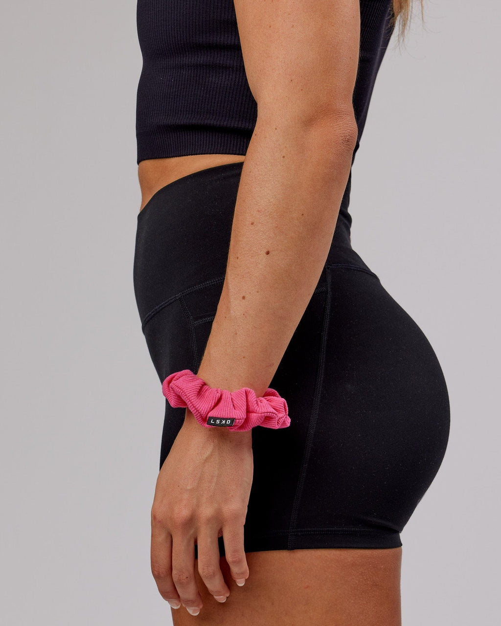 Model wearing Ribbed Scrunchie - Flamingo