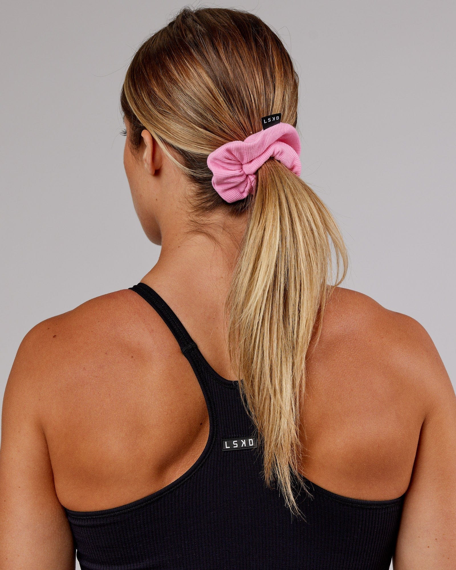 Model wearing Ribbed Scrunchie - Pink