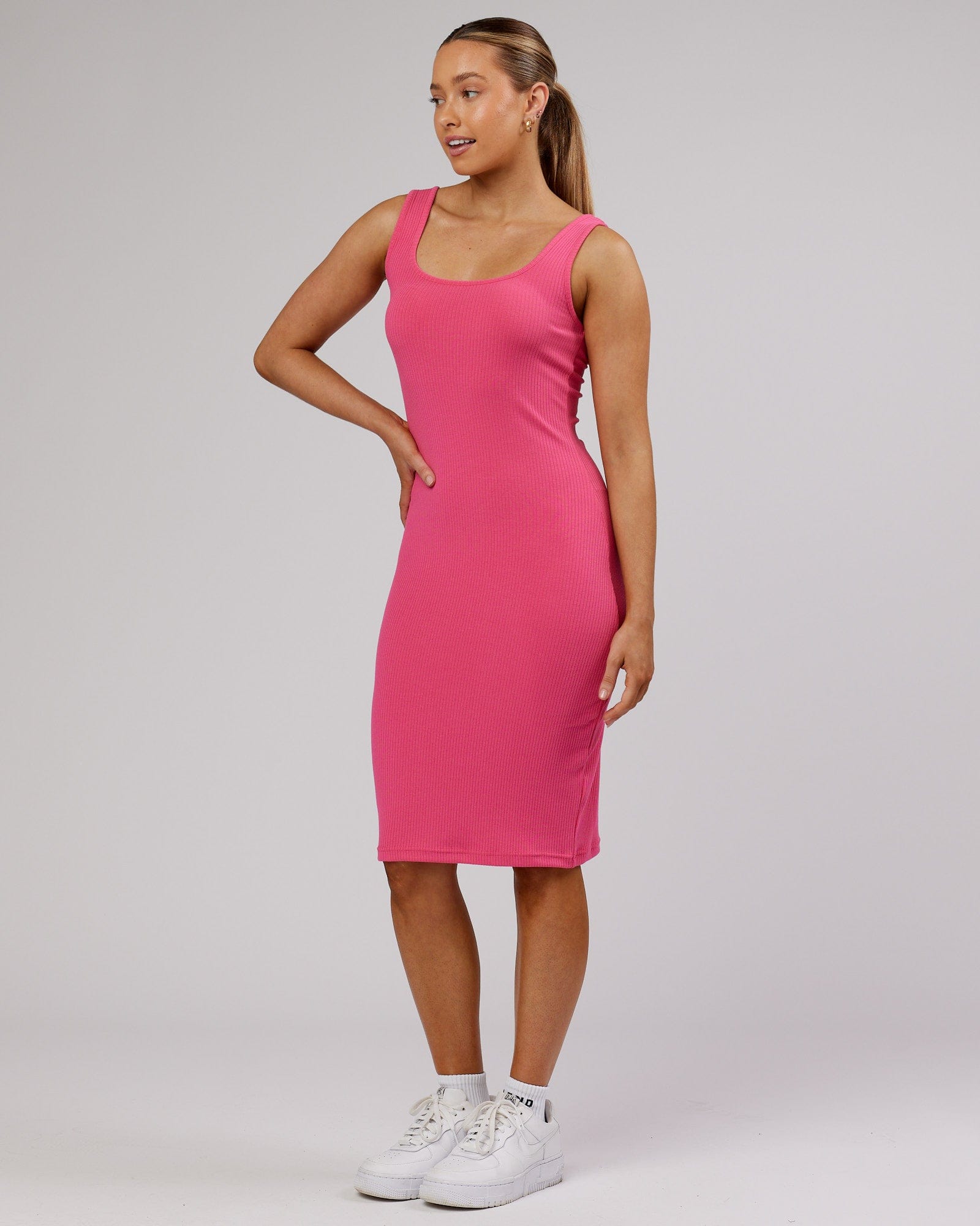 Model wearing Rory Ribbed Dress - Flamingo