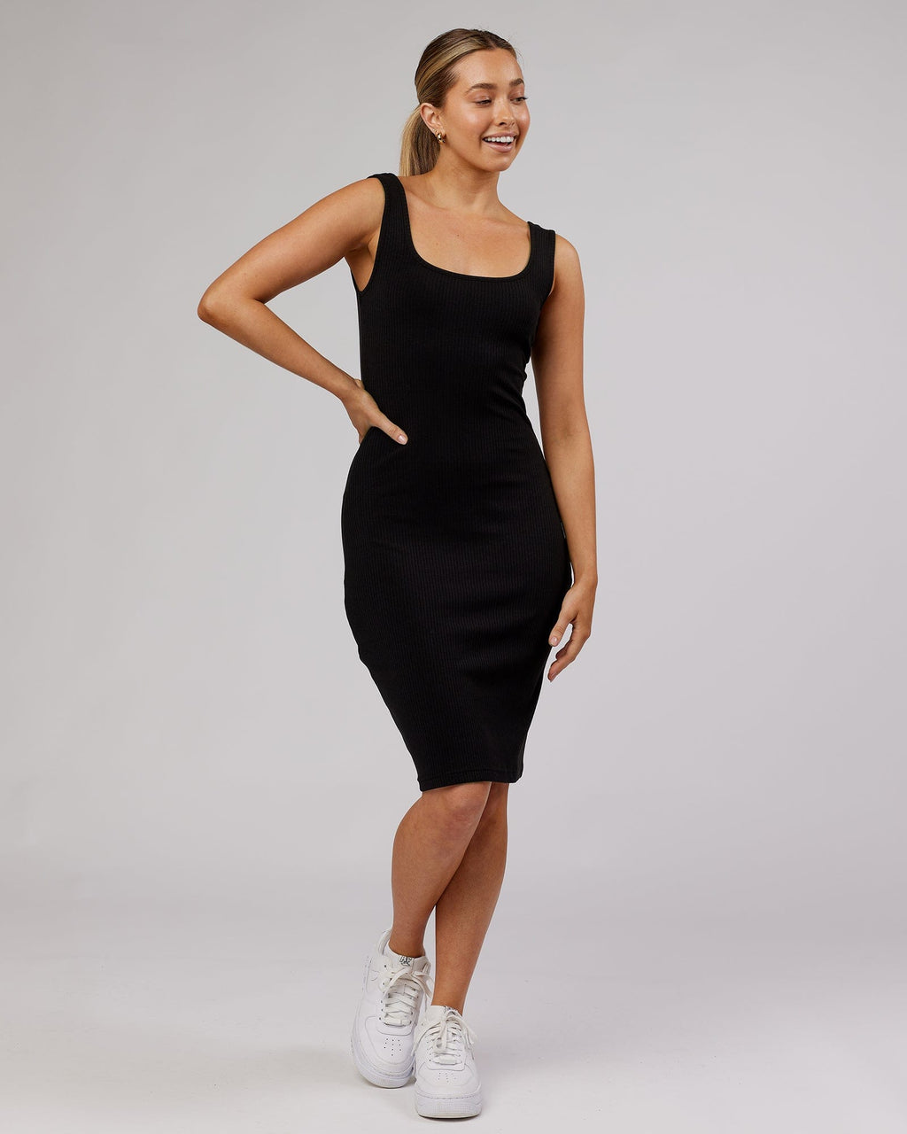 Model wearing Rory Ribbed Dress - Black