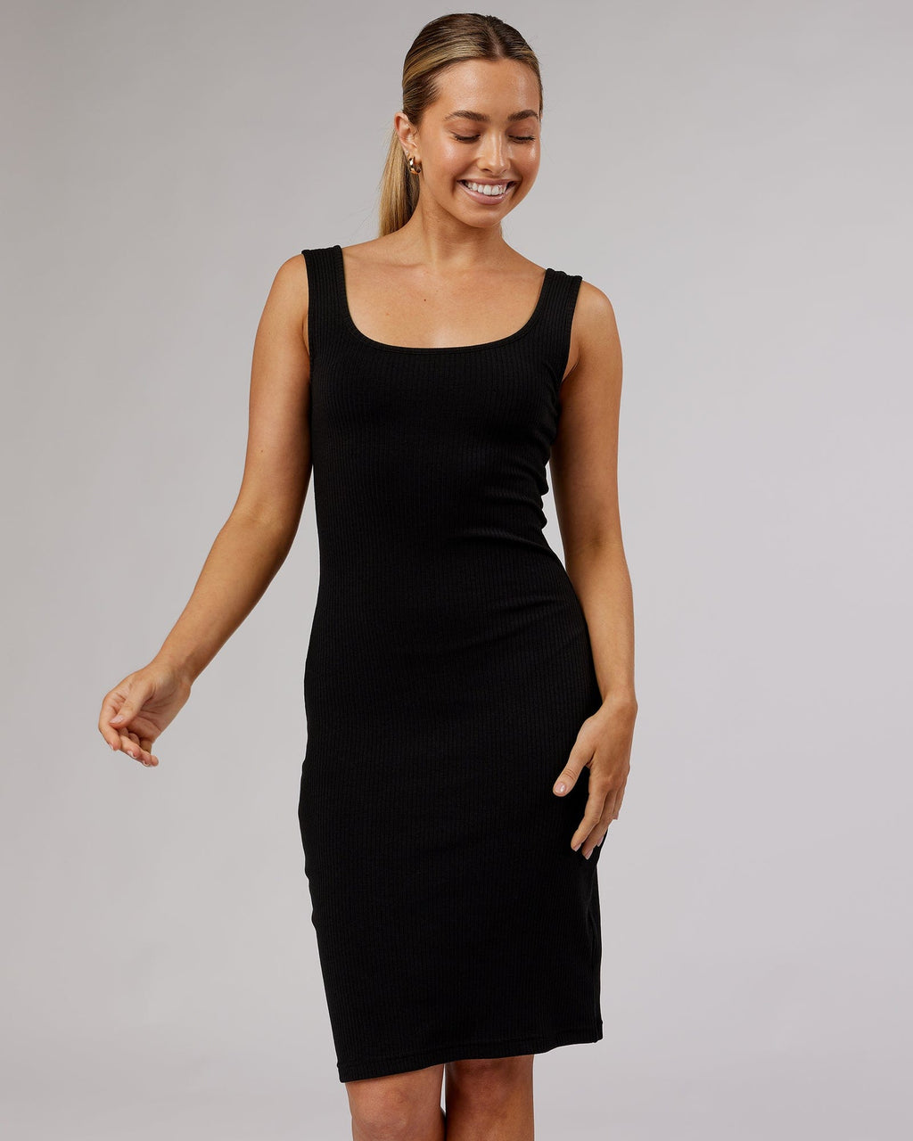 Model wearing Rory Ribbed Dress - Black