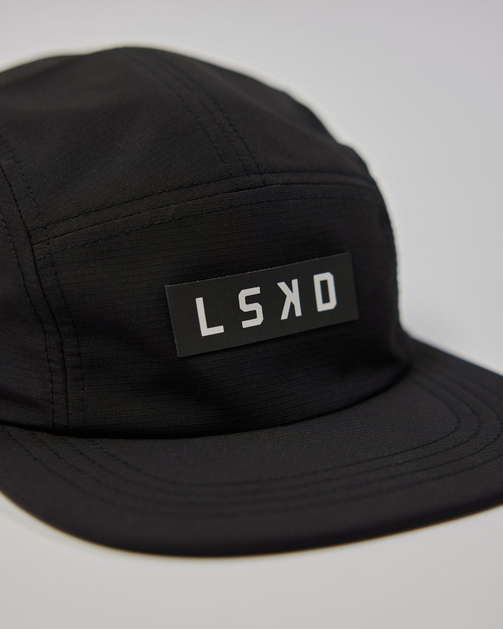 Model wearing Run Club Cap - Black