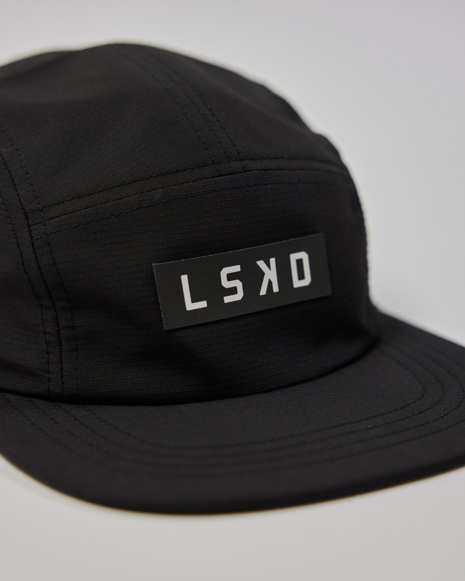 Model wearing Run Club Cap - Black