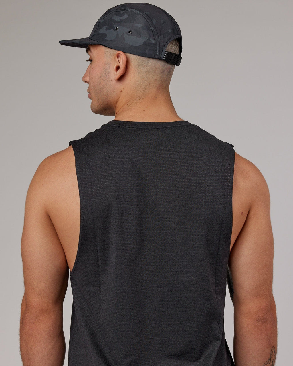 Model wearing Run Club Cap - Camo