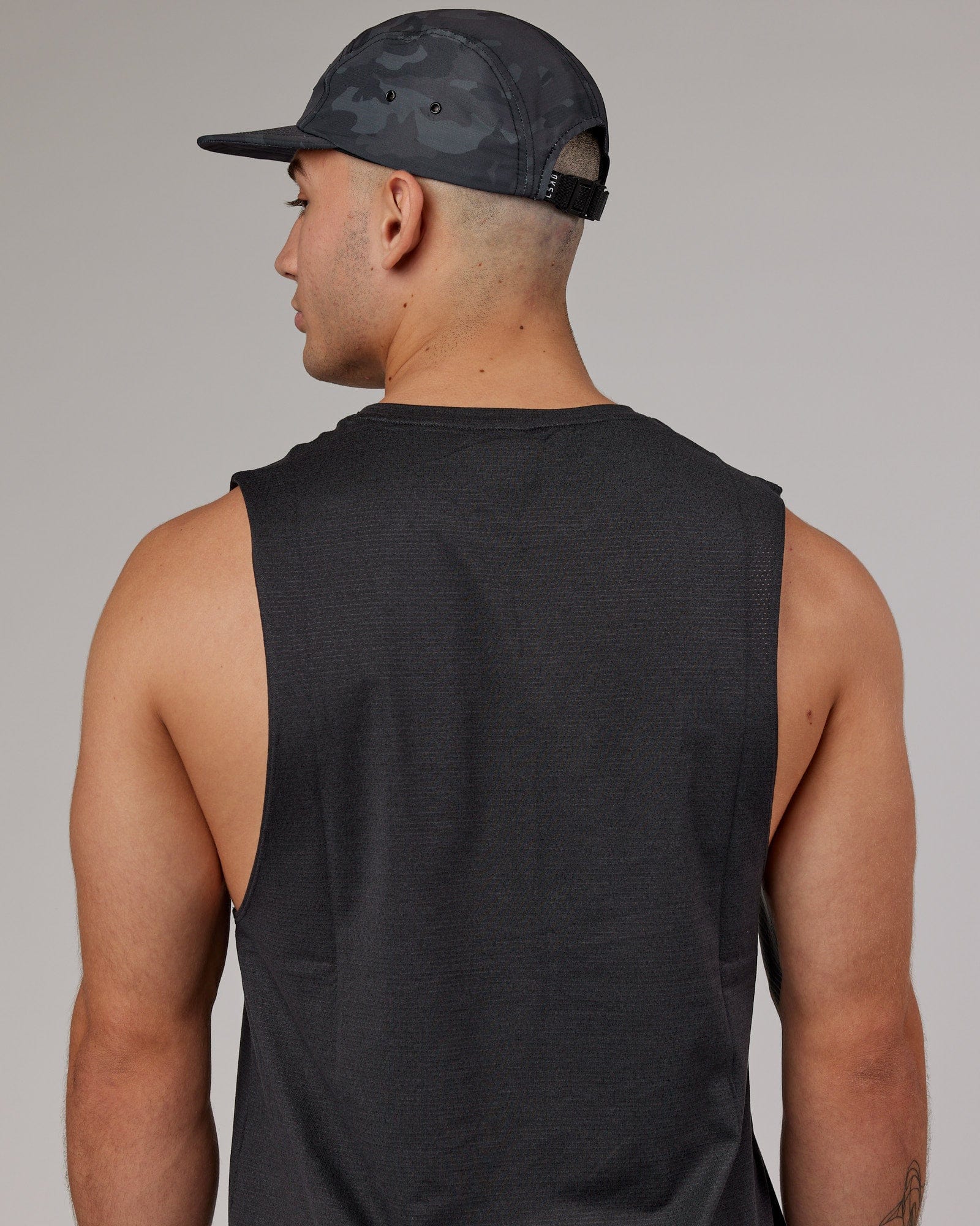 Model wearing Run Club Cap - Camo