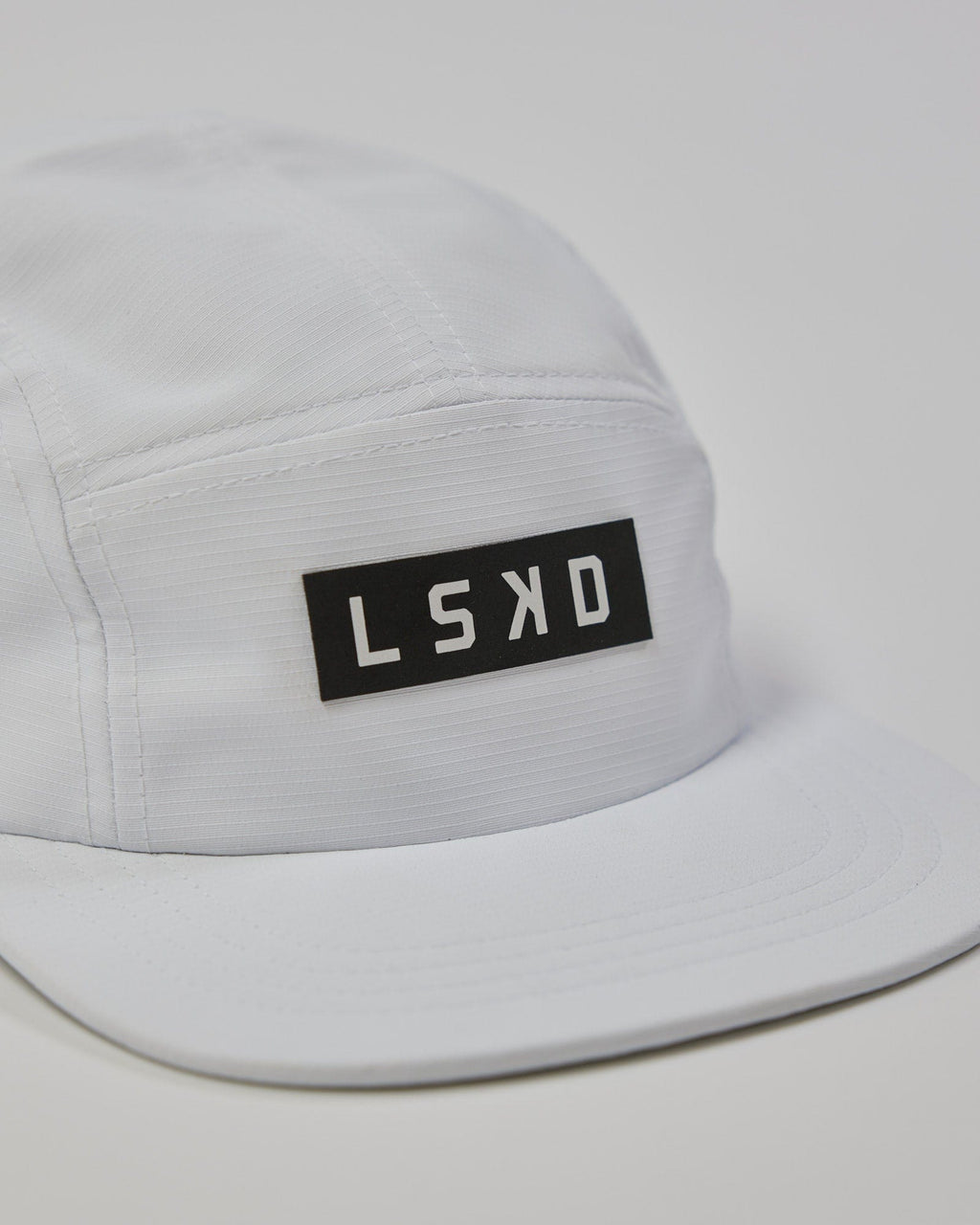 Model wearing Run Club Cap - White