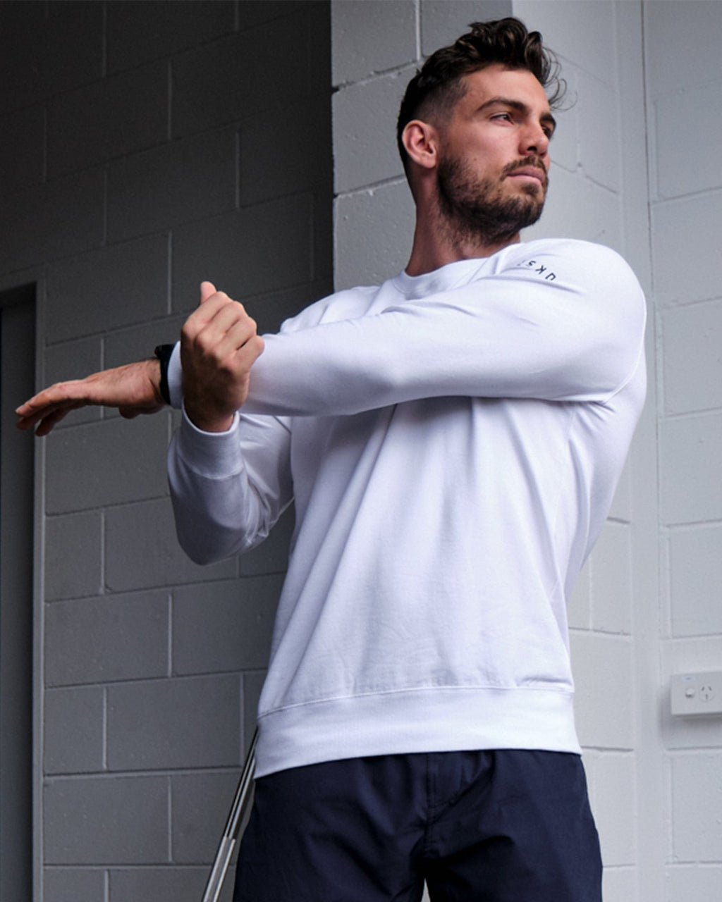 Model wearing Rival FLXFleece Training Fit Sweater - White