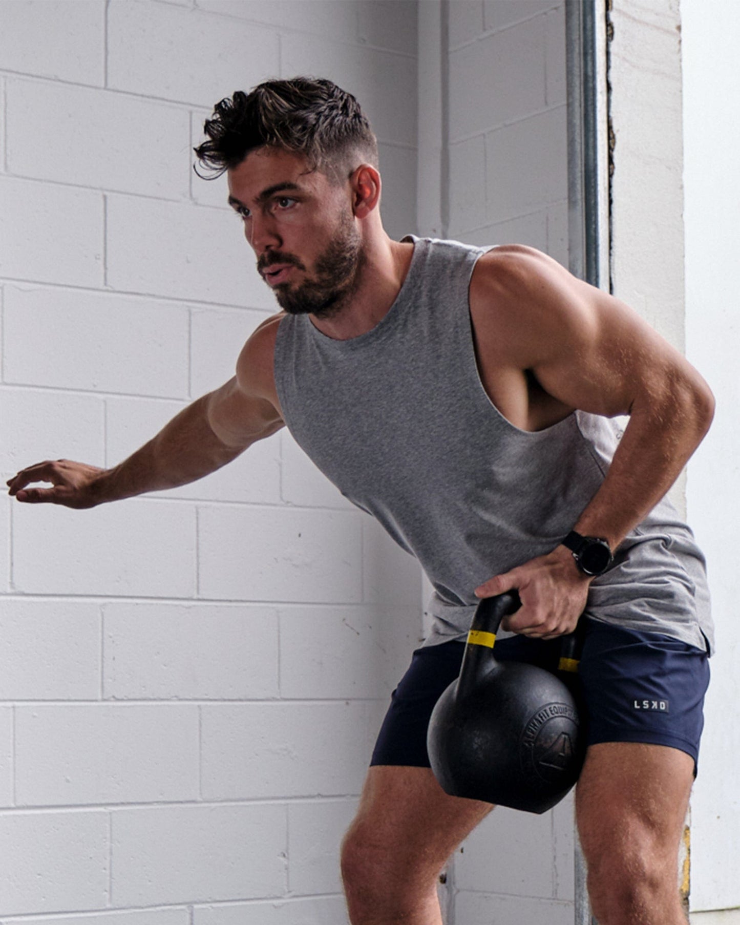 Model wearing Rival FLXCotton Training Fit Tank - Lt Grey Marl