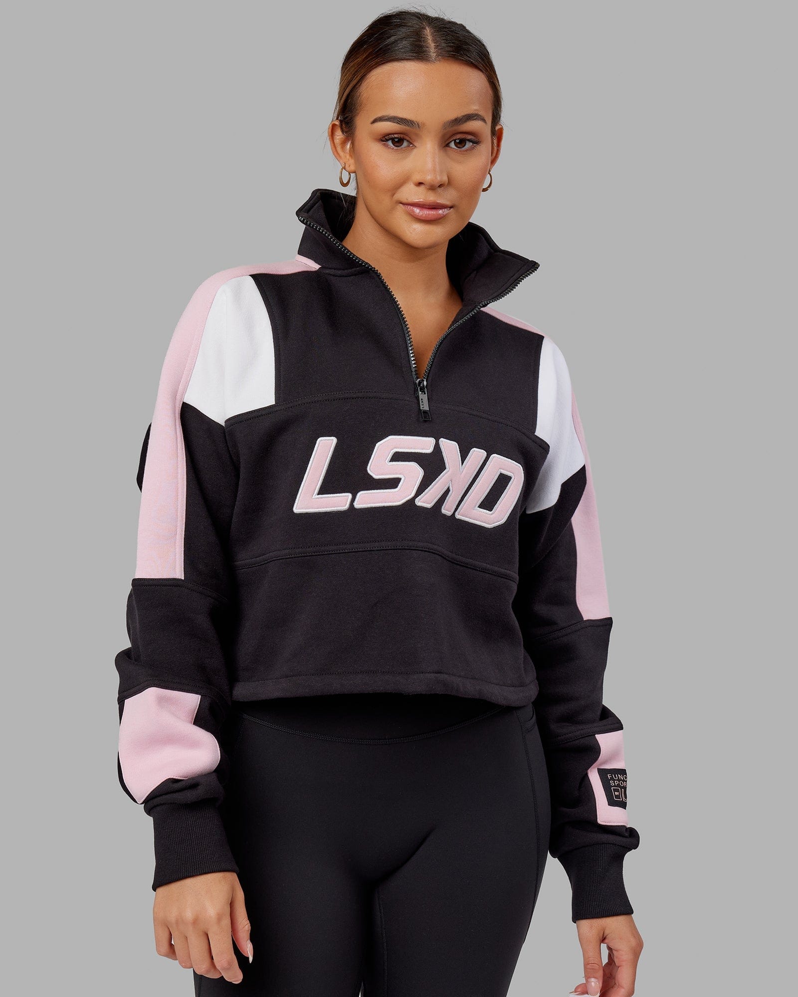 Model wearing Slam 1/4 Zip Sweater - Black-Petal Pink