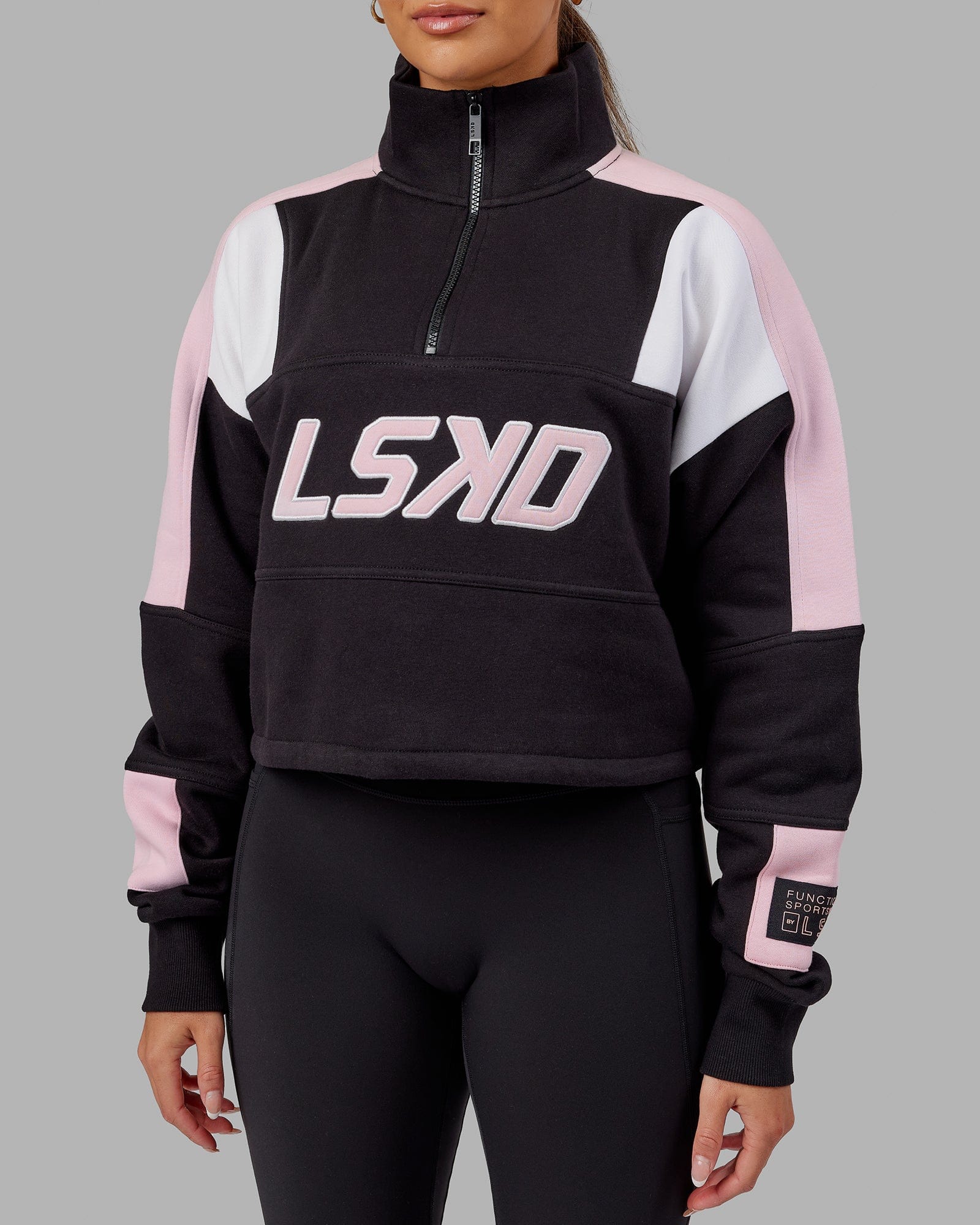 Model wearing Slam 1/4 Zip Sweater - Black-Petal Pink