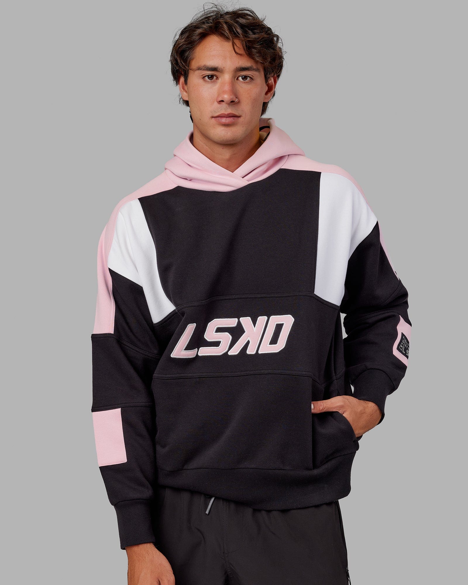 Model wearing Slam Hoodie Oversize - Black-Petal Pink