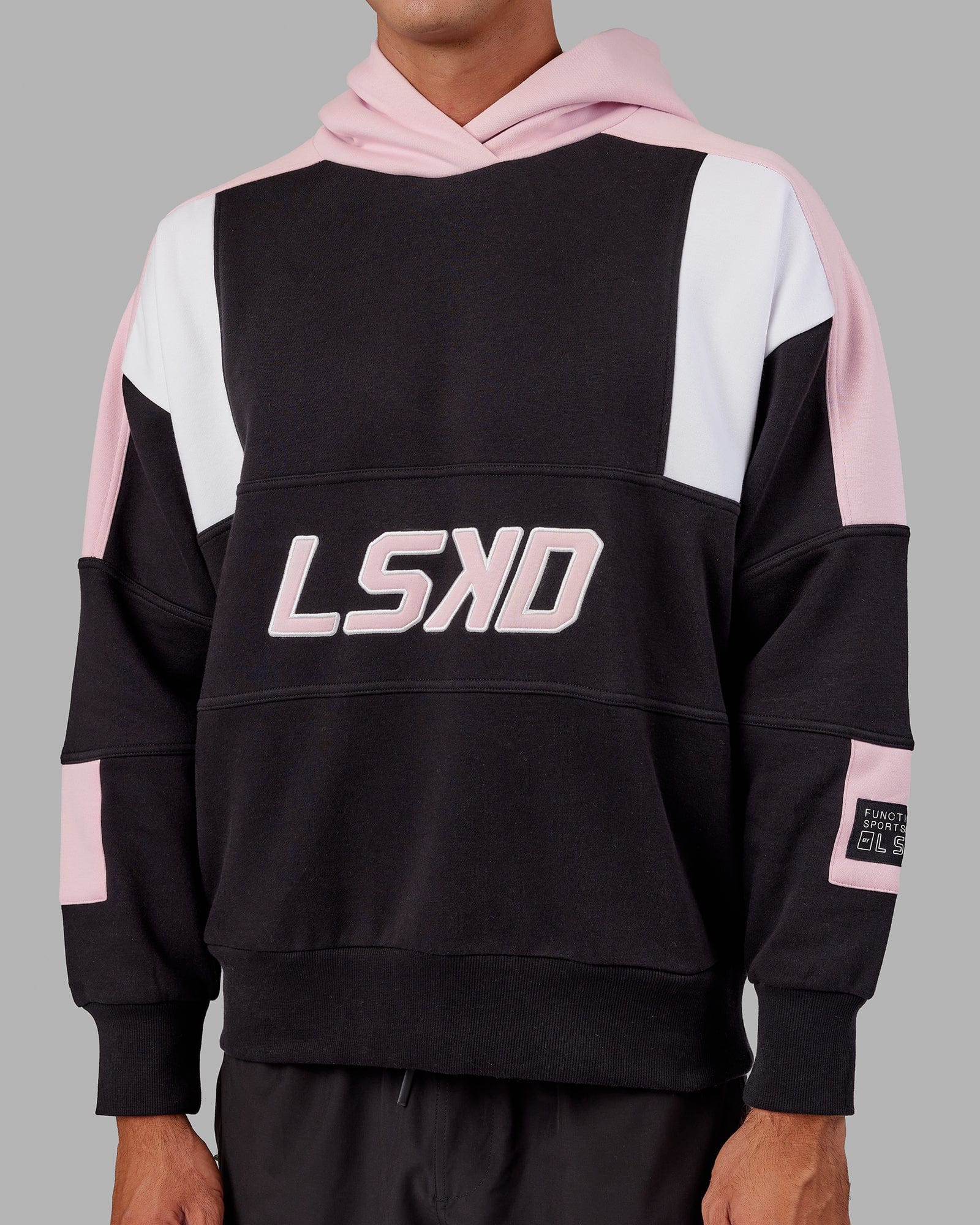 Model wearing Slam Hoodie Oversize - Black-Petal Pink